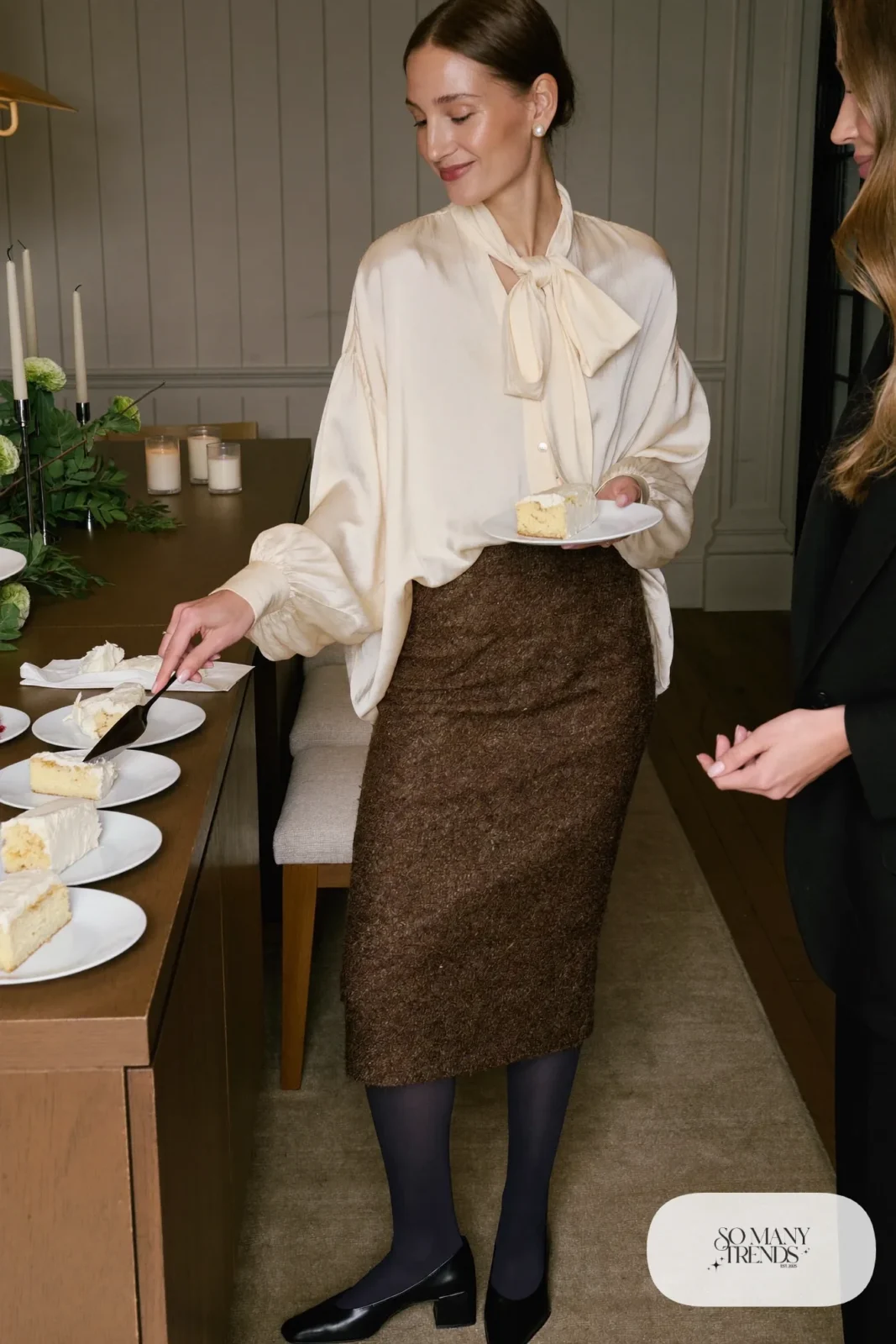 Look 24: cream satin neck-bow blouse, brown tweed midi skirt, opaque tights, block heel pumps