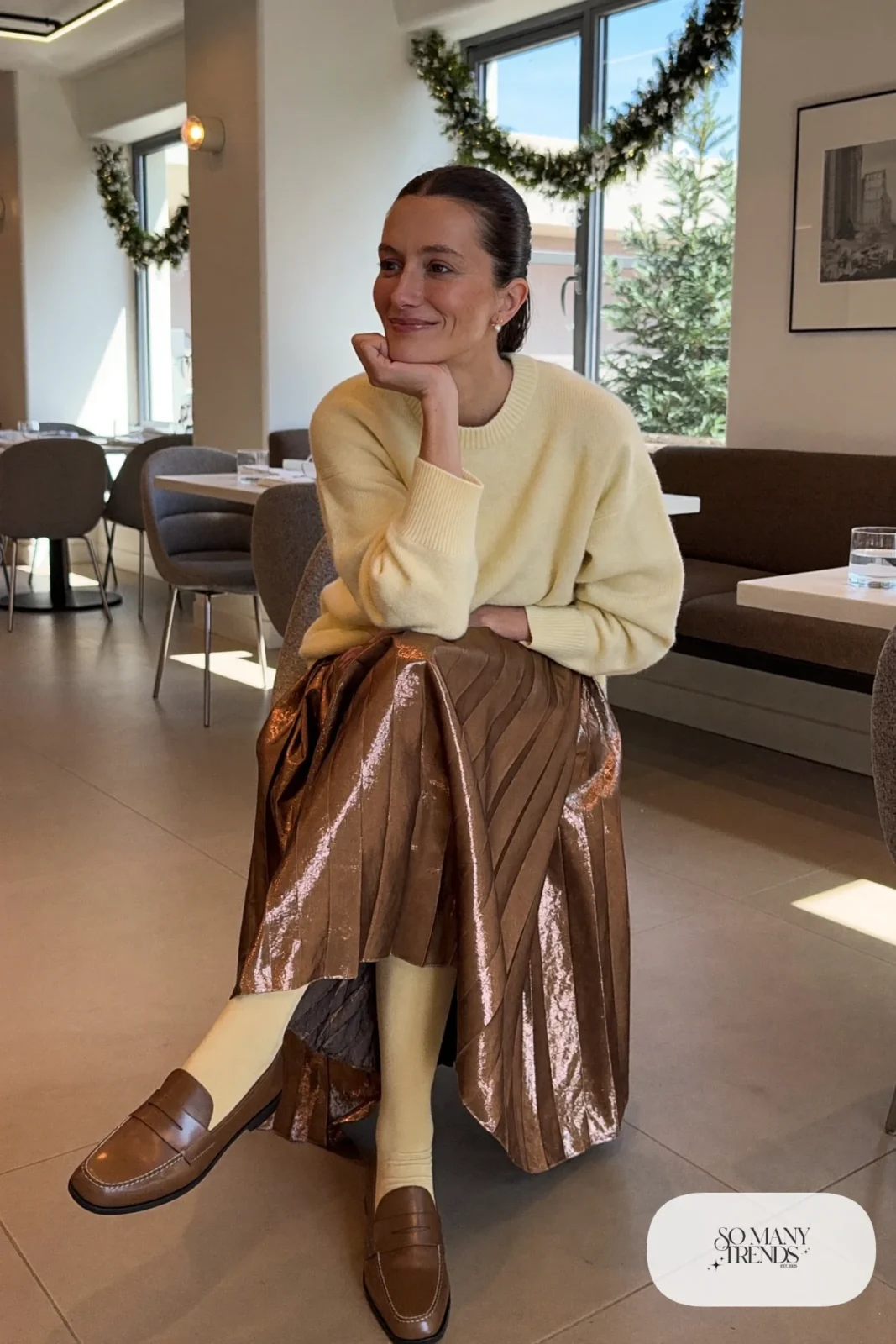 Look 29: bronze metallic pleated midi skirt, cream loose sweater, mocha loafers, opaque tights