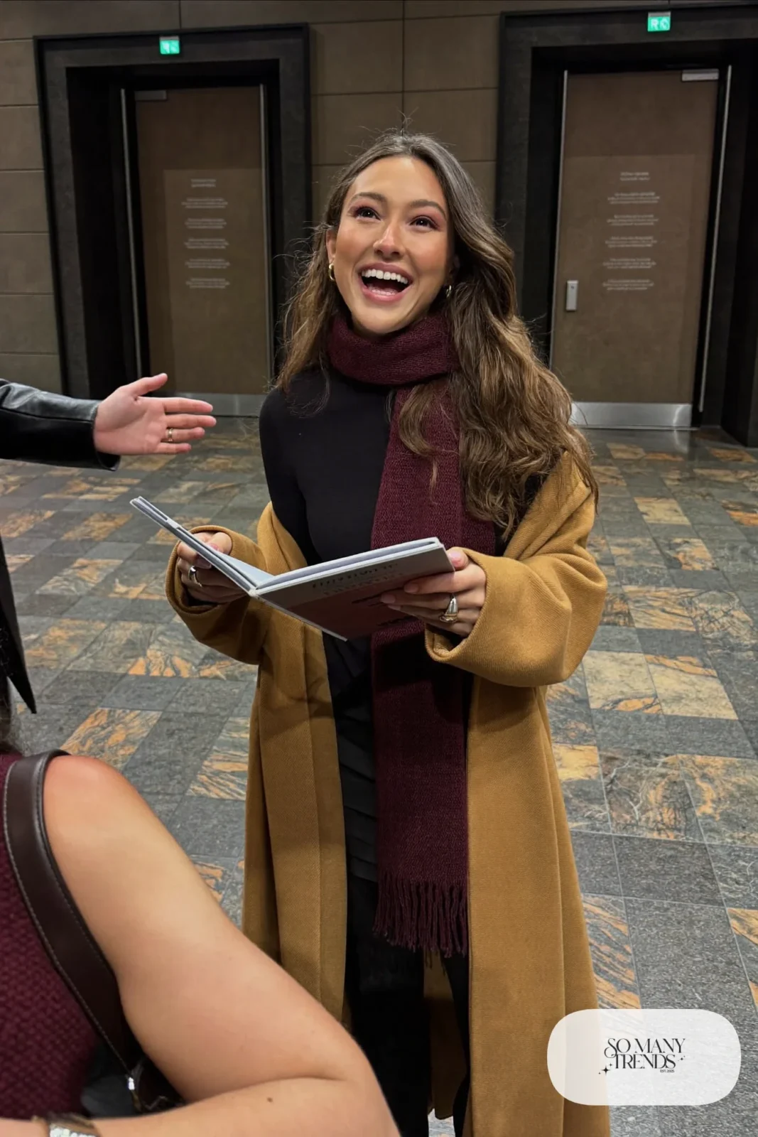 black rib-knit midi dress, long camel wool coat, burgundy scarf, black opaque tights, black ankle boots, nutcracker outfit 26