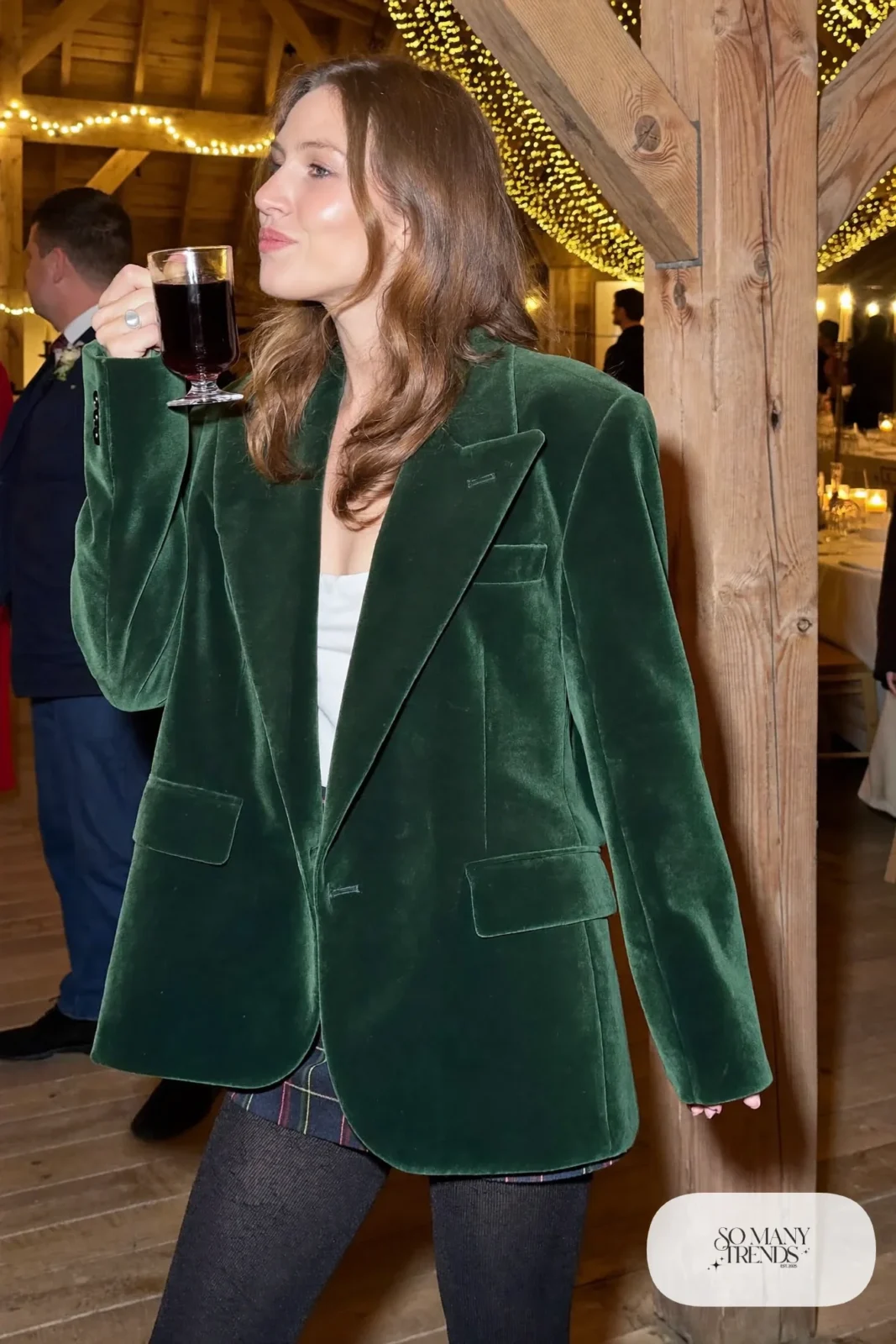forest green velvet blazer, navy and green plaid wool midi skirt, black tights, black leather boots, charcoal overcoat, winter wedding guest outfit 2