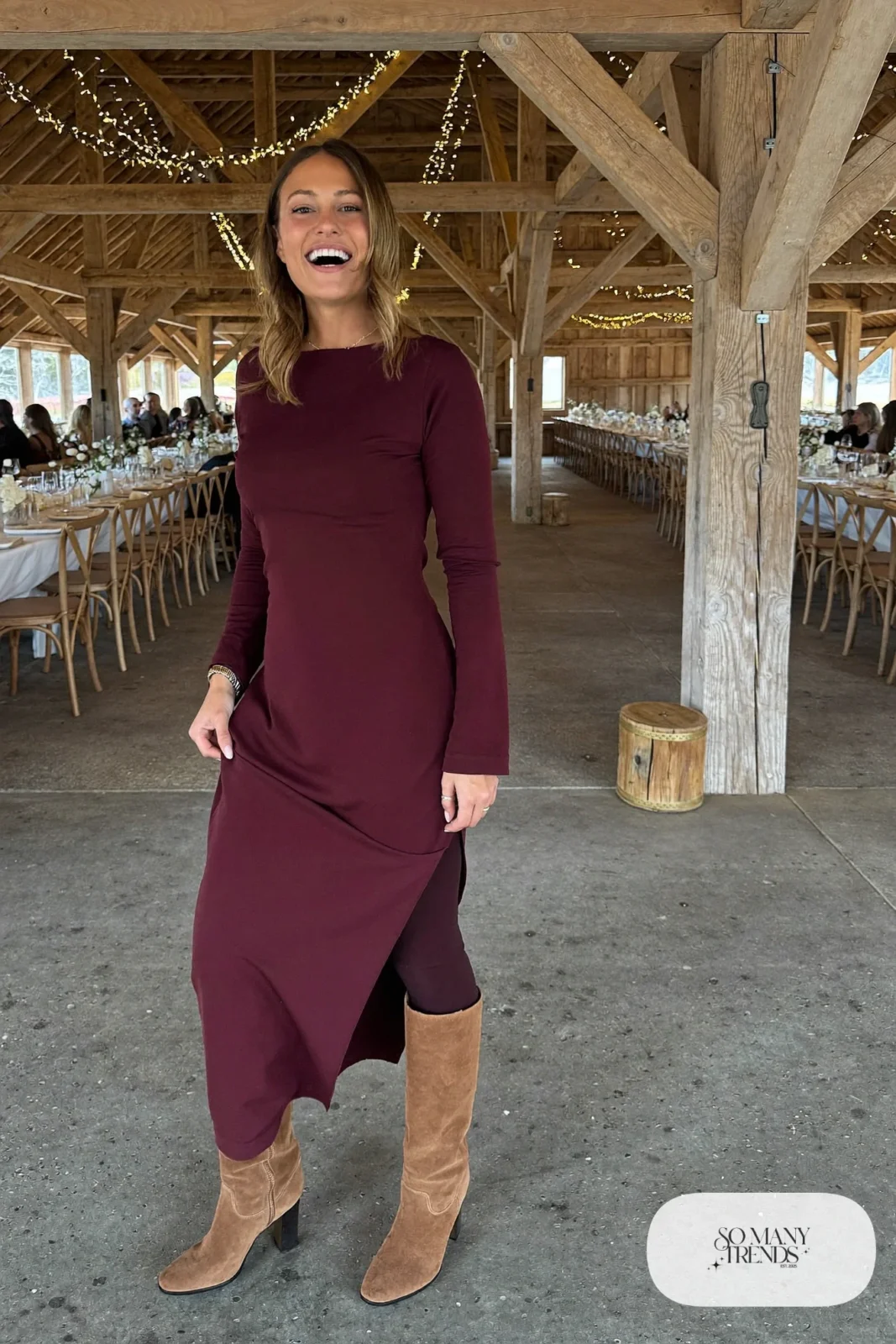 burgundy long-sleeve crepe wrap midi dress, tan suede knee-high boots, opaque tights, shearling-style long coat, winter wedding guest outfit 3