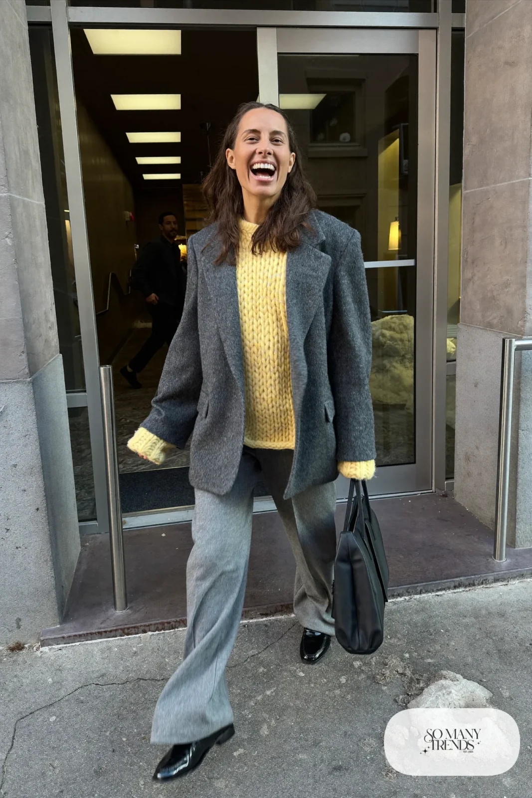 Look 8: butter yellow chunky sweater, charcoal gray oversized blazer, gray wide-leg wool pants and black loafers
