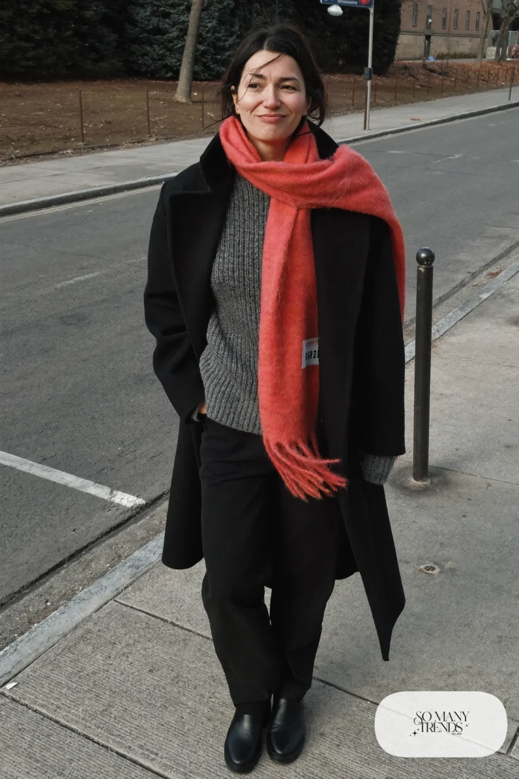 Look 11: black long wool coat, oversized coral wool scarf, gray knit sweater, black straight pants and black ankle boots