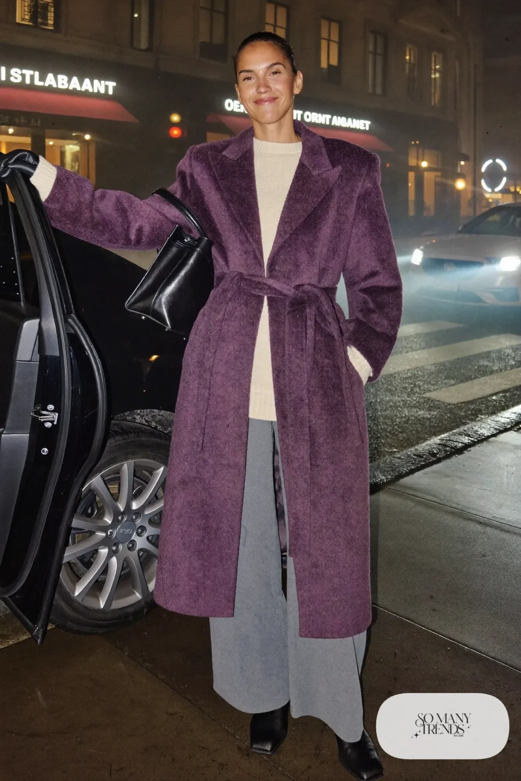 Look 16: plum wool wrap coat with belt, cream knit sweater, gray wide-leg pants and black ankle boots