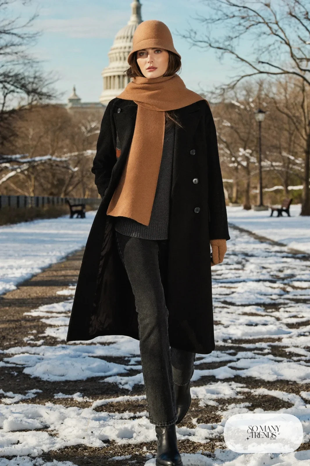 Woman in a camel wool hat, scarf and gloves set with a black coat, jeans and black boots, outfit 17