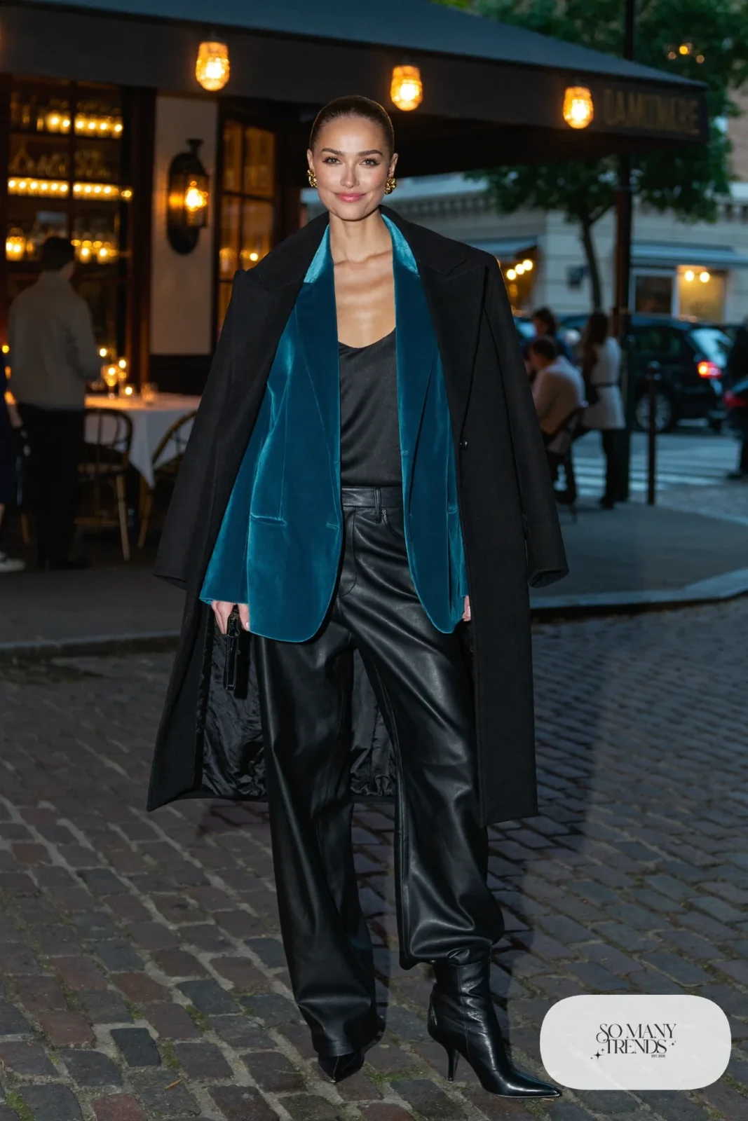Woman in a teal velvet blazer, black camisole, black wide-leg pants and black heeled boots in Georgetown, outfit 20