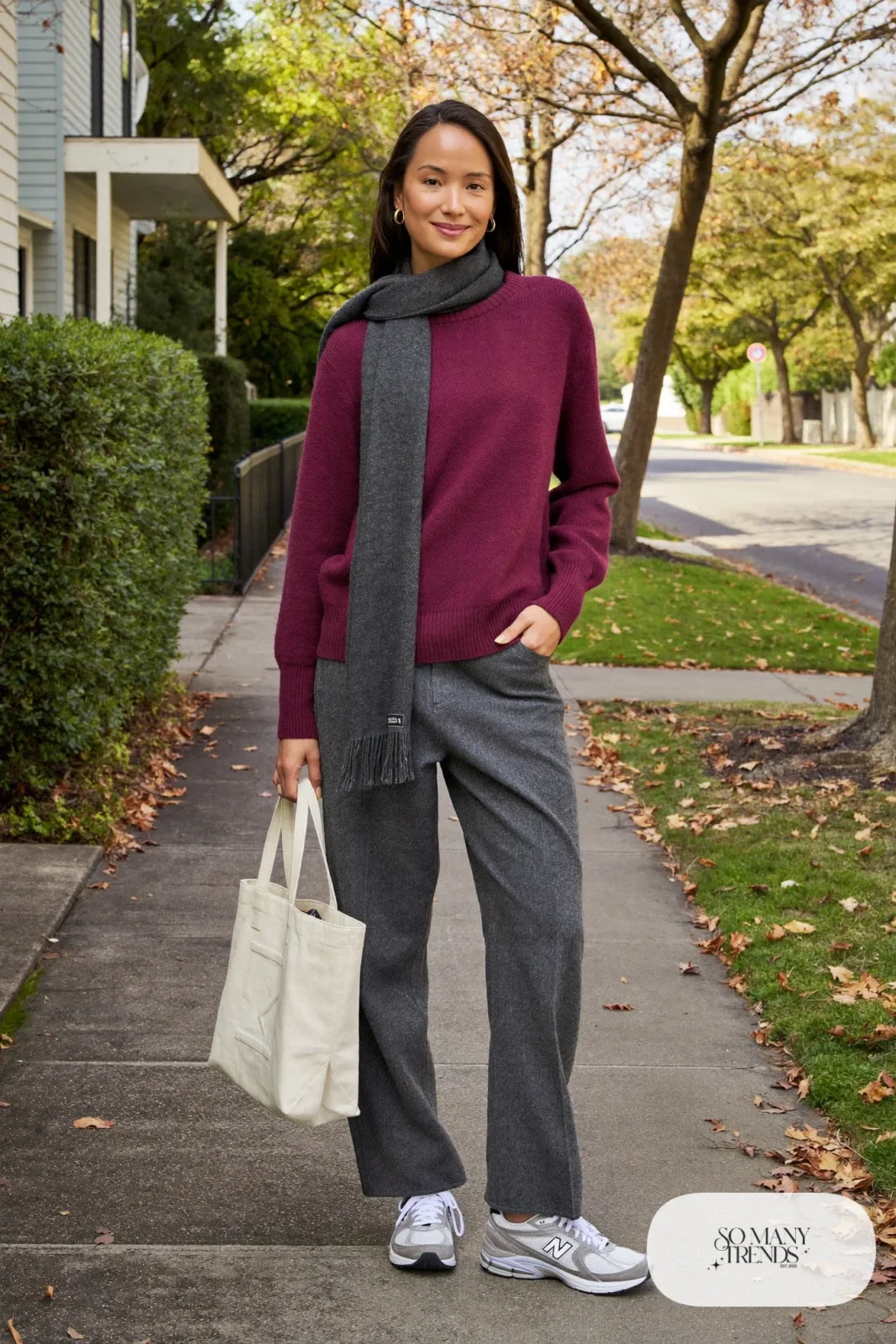 Plum fine-knit sweater, heather gray straight-leg pants and chunky silver-white New Balance 740 sneakers, outfit 1