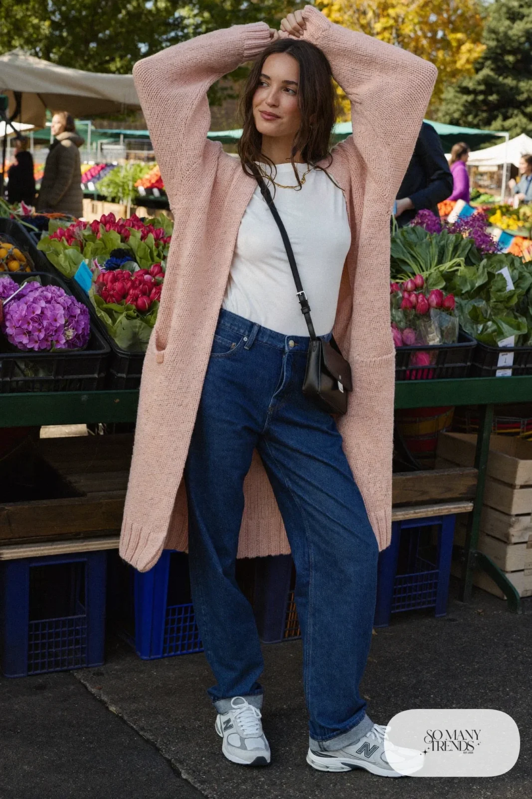 Long blush cardigan, white tee, dark straight jeans and New Balance 740 sneakers, outfit 3