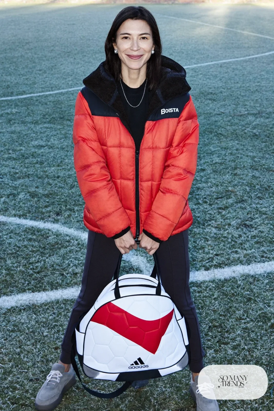 Woman in a red hooded flannel jacket, black tee, charcoal joggers and gray platform sneakers, outfit 13