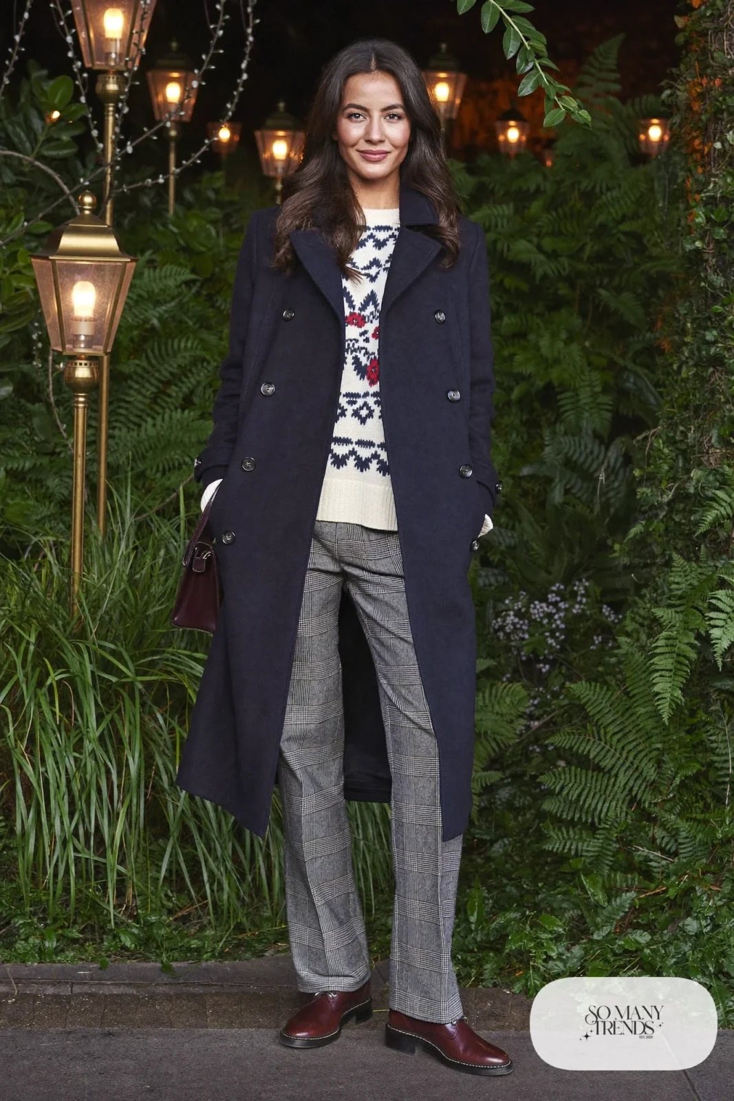 Navy peacoat over ivory fair isle sweater, gray flannel pants and brown leather boots, outfit 3