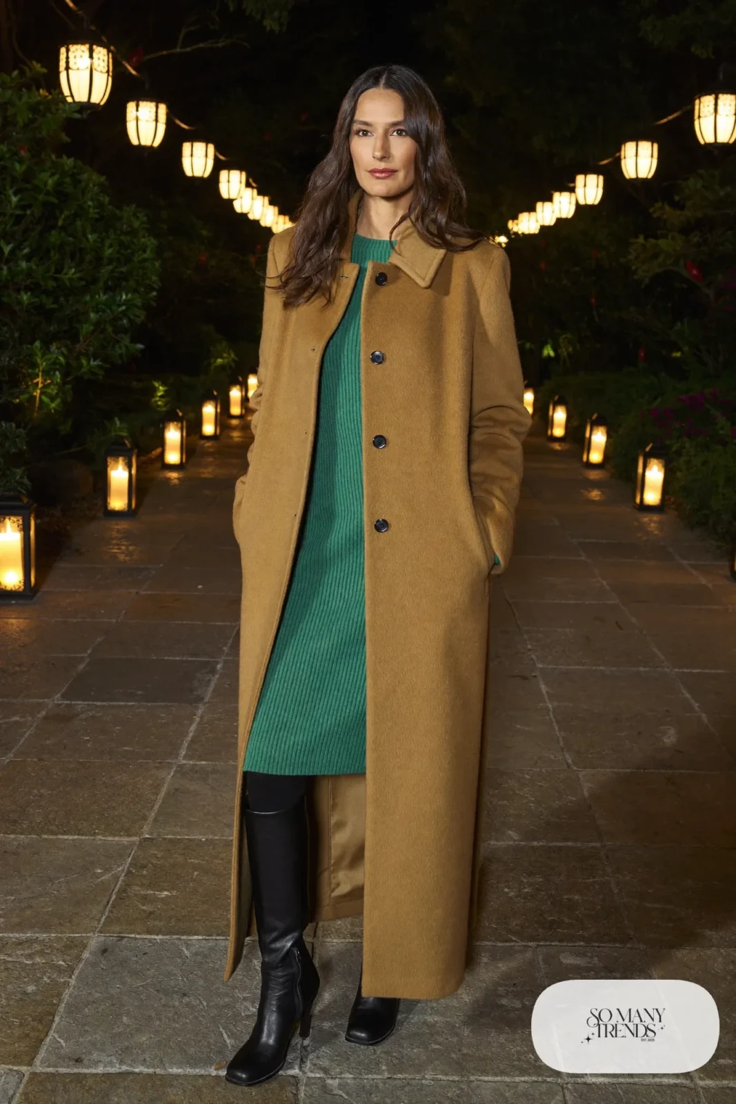 Forest green knit midi dress with black opaque tights, long camel coat and black knee-high boots, outfit 7
