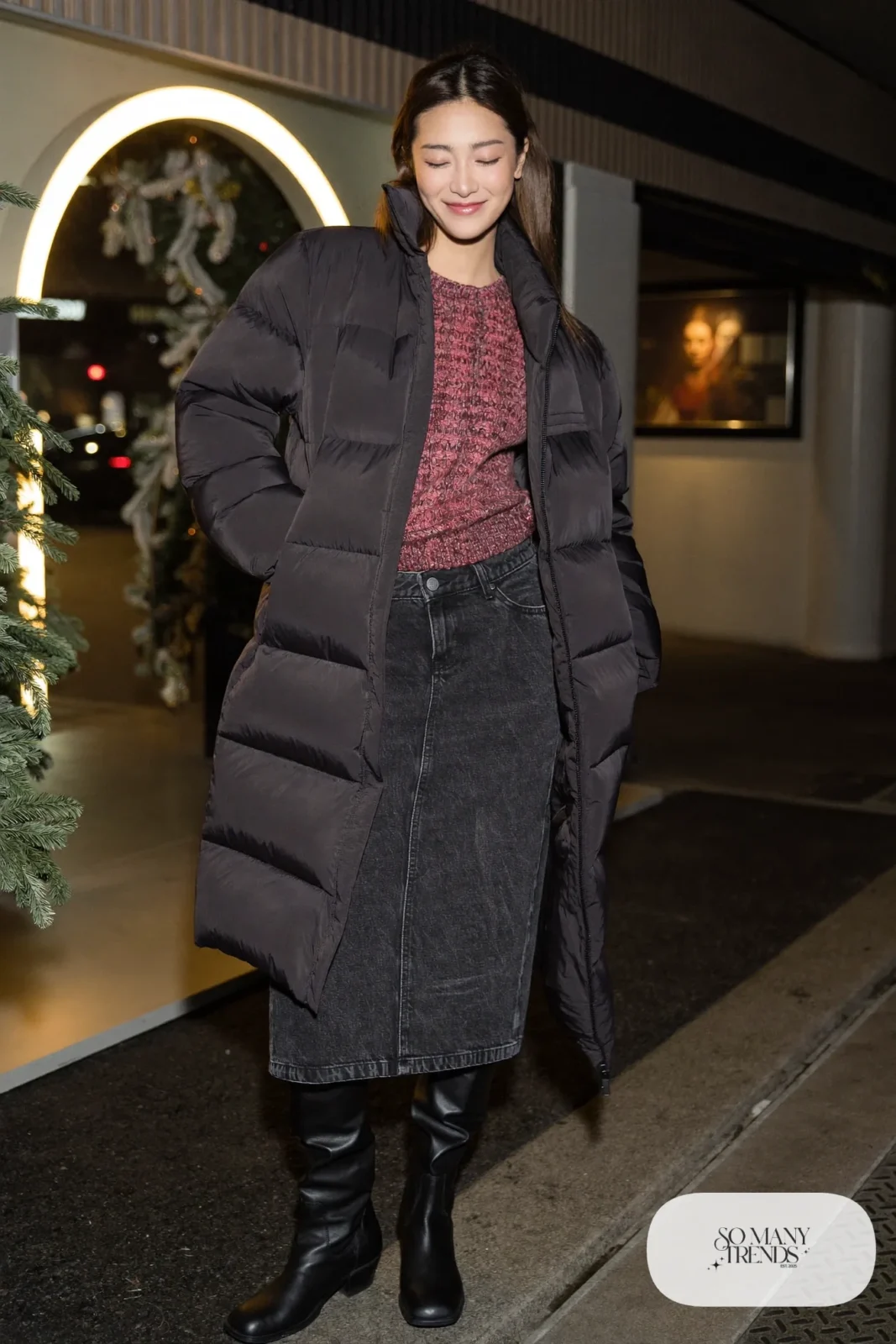 Black denim midi skirt with cranberry sweater, black tights, black ankle-height boots and long puffer coat, outfit 14