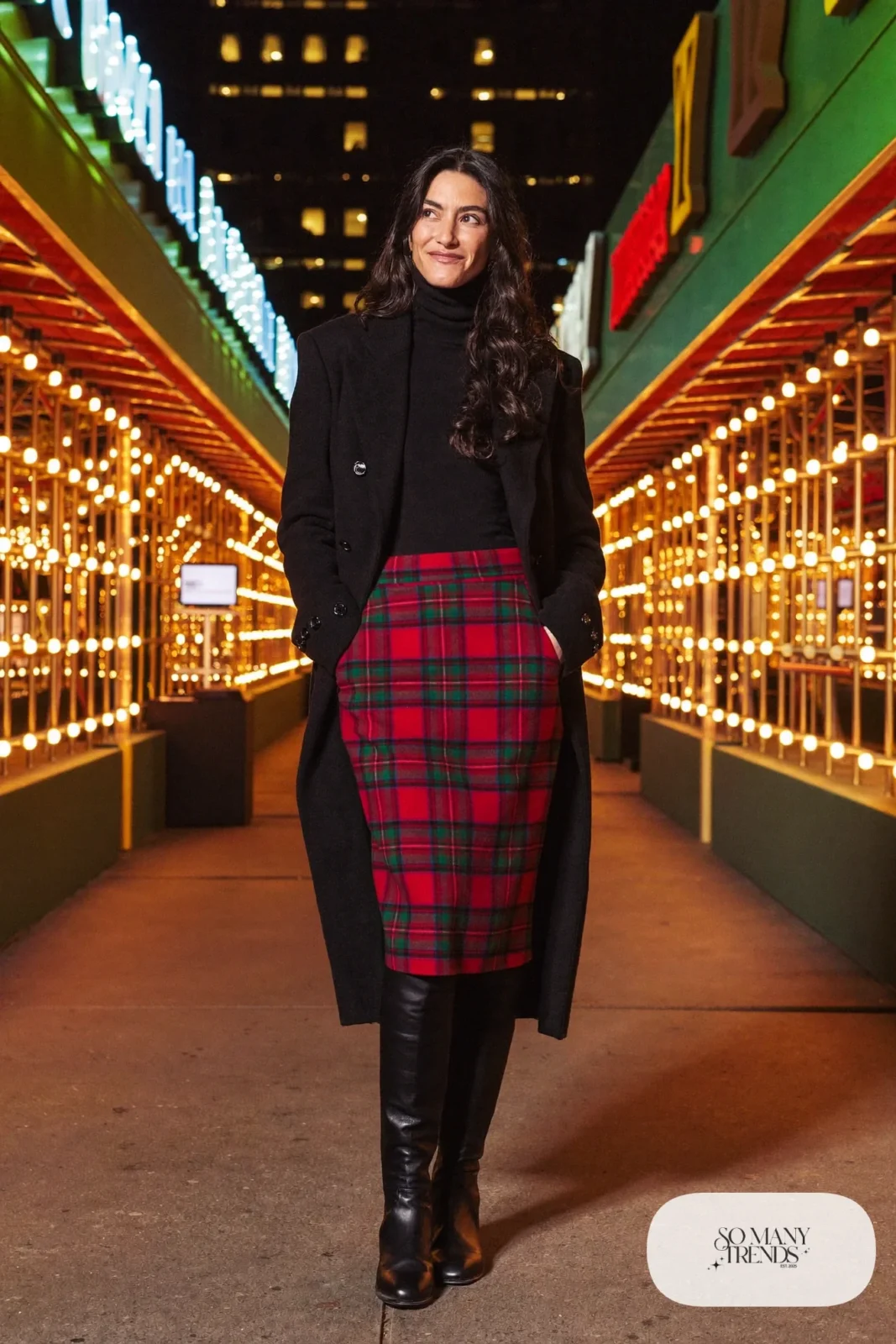 Red and green plaid wool midi skirt with black turtleneck, black tights, black boots and long black coat, outfit 16