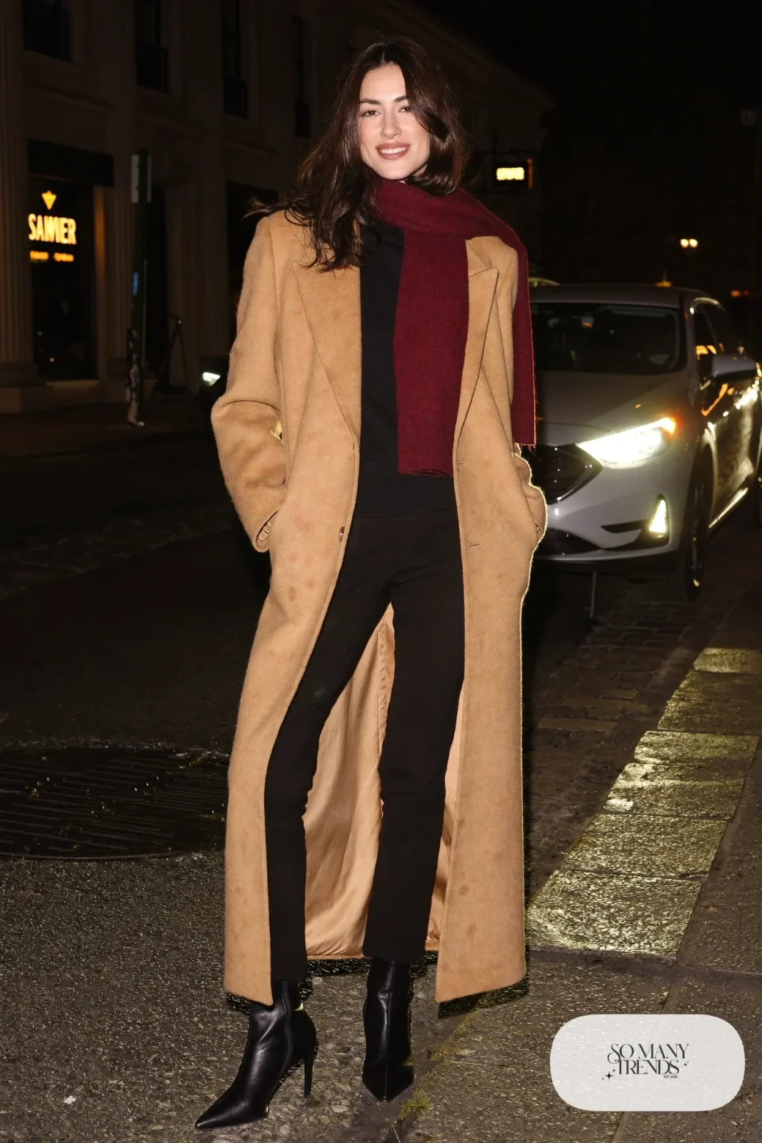 Long camel tailored wool blazer-coat over black knit top, black pants, black boots and cranberry scarf, outfit 28