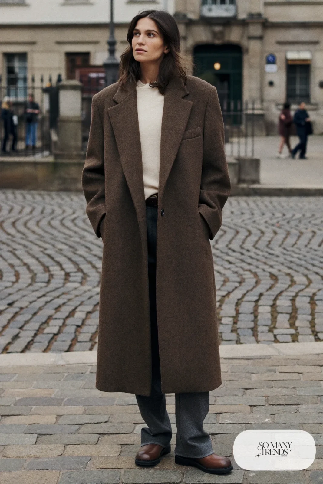 Long mocha wool coat, cream merino sweater, charcoal wool pants and brown lug-sole boots, Prague winter outfit 1