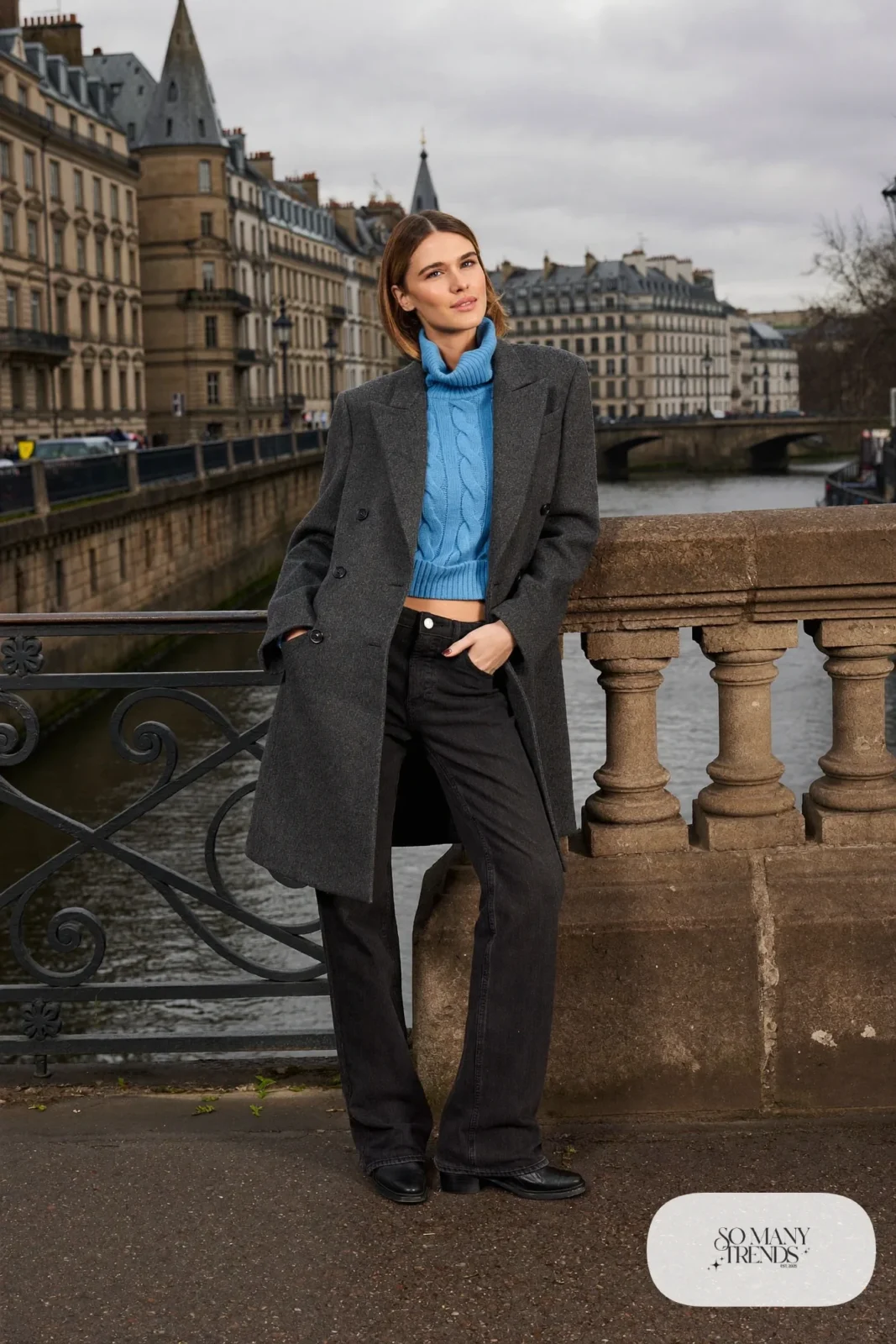Charcoal wool peacoat, sky blue chunky knit sweater, dark straight jeans and black ankle boots, Prague winter outfit 2