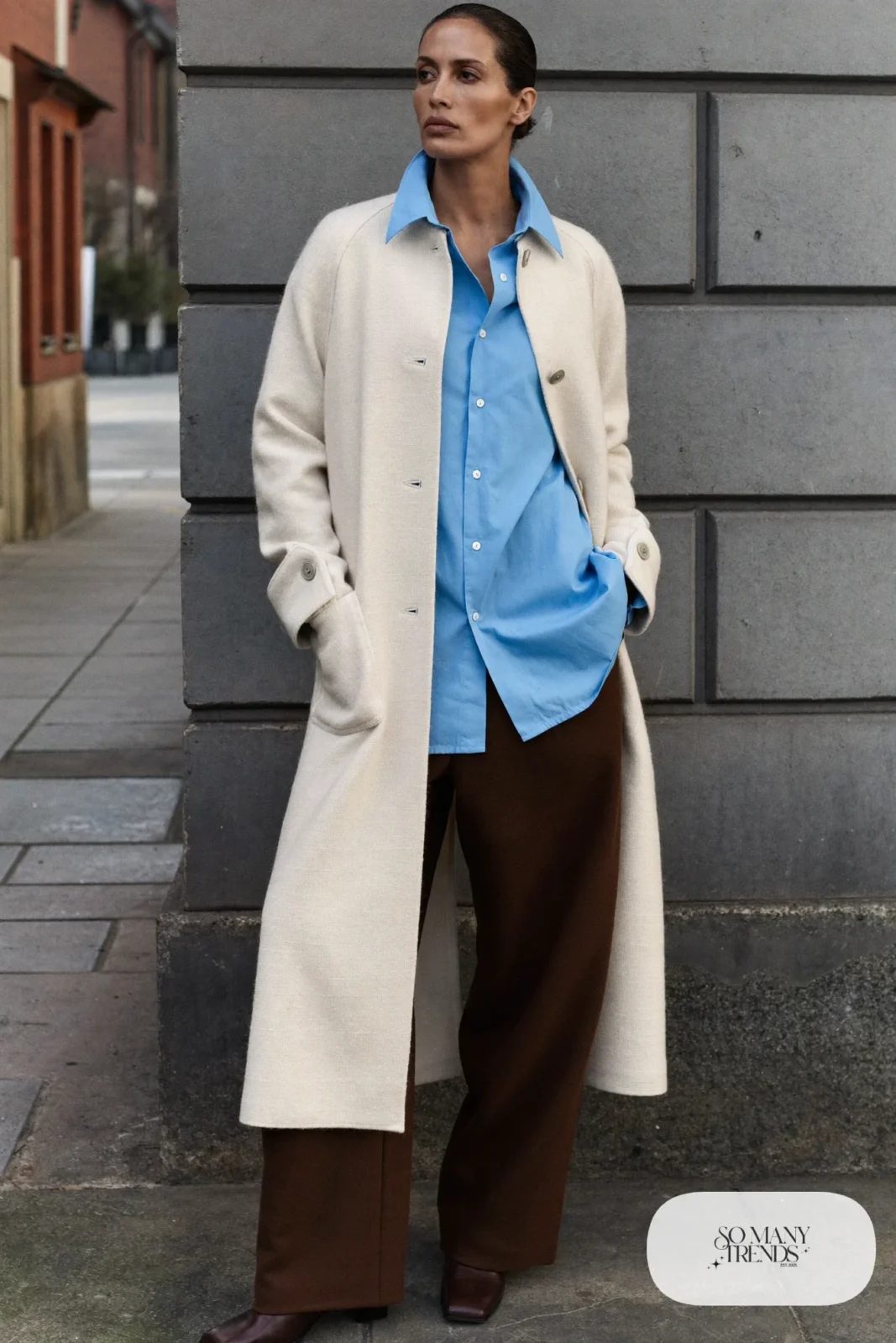 Cream knit cardigan coat, sky blue cotton shirt, mocha wool pants and brown low-heel leather boots, Prague winter outfit 6