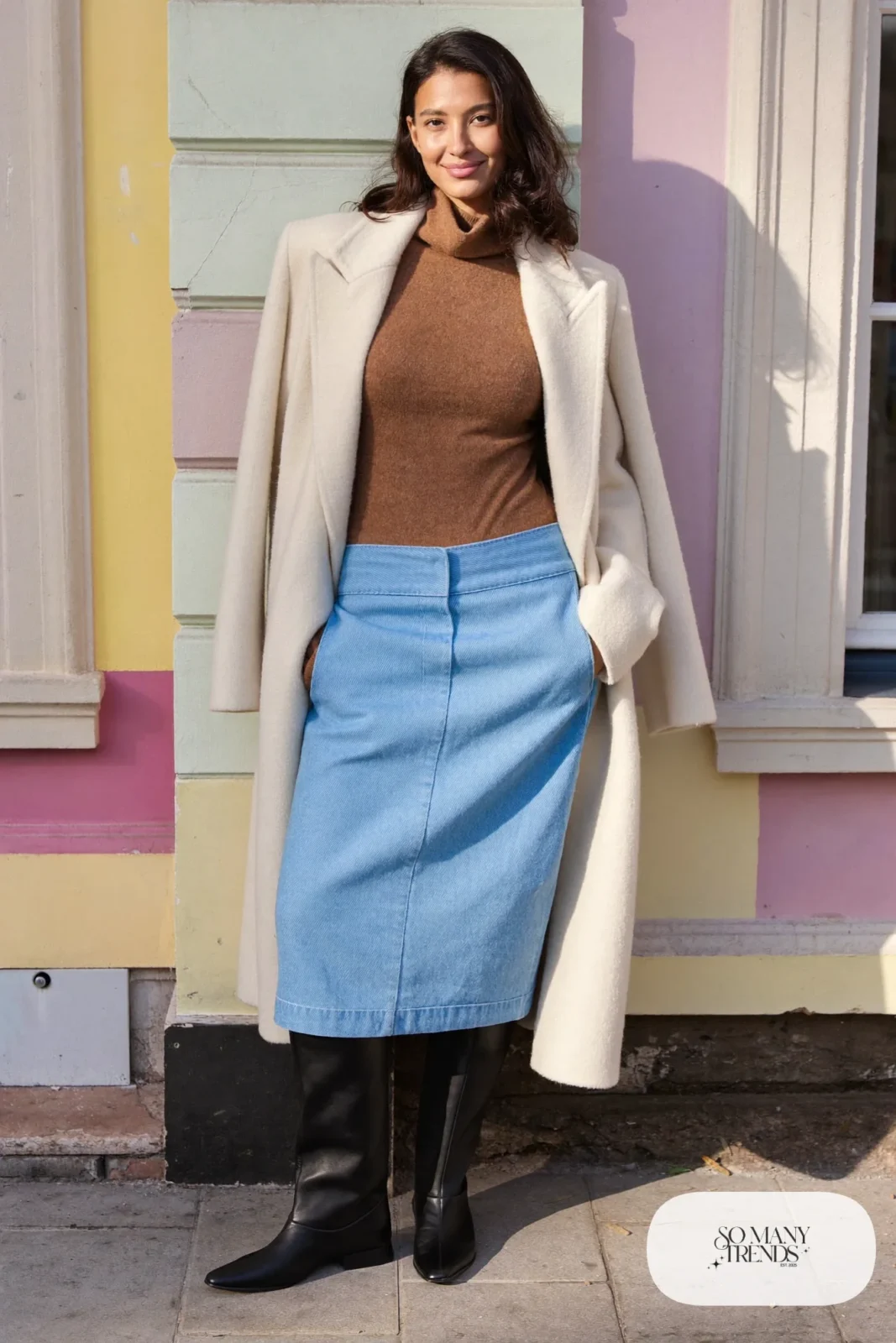Mocha turtleneck sweater, sky blue wool midi skirt, thick black tights, cream coat and tall flat boots, Prague winter outfit 9
