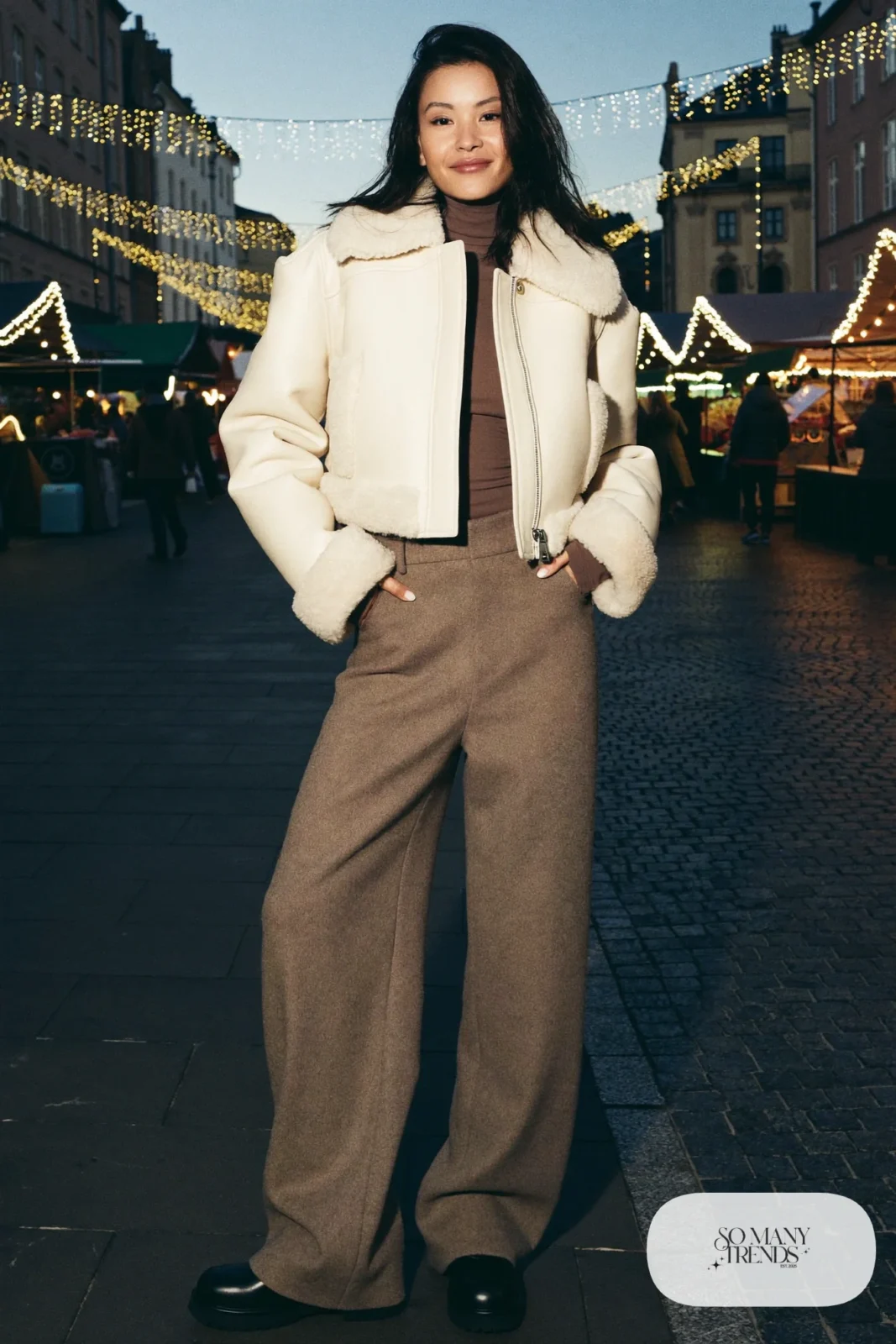Cream faux shearling cropped jacket, mocha turtleneck, wide wool pants and waterproof boots, Prague winter outfit 18
