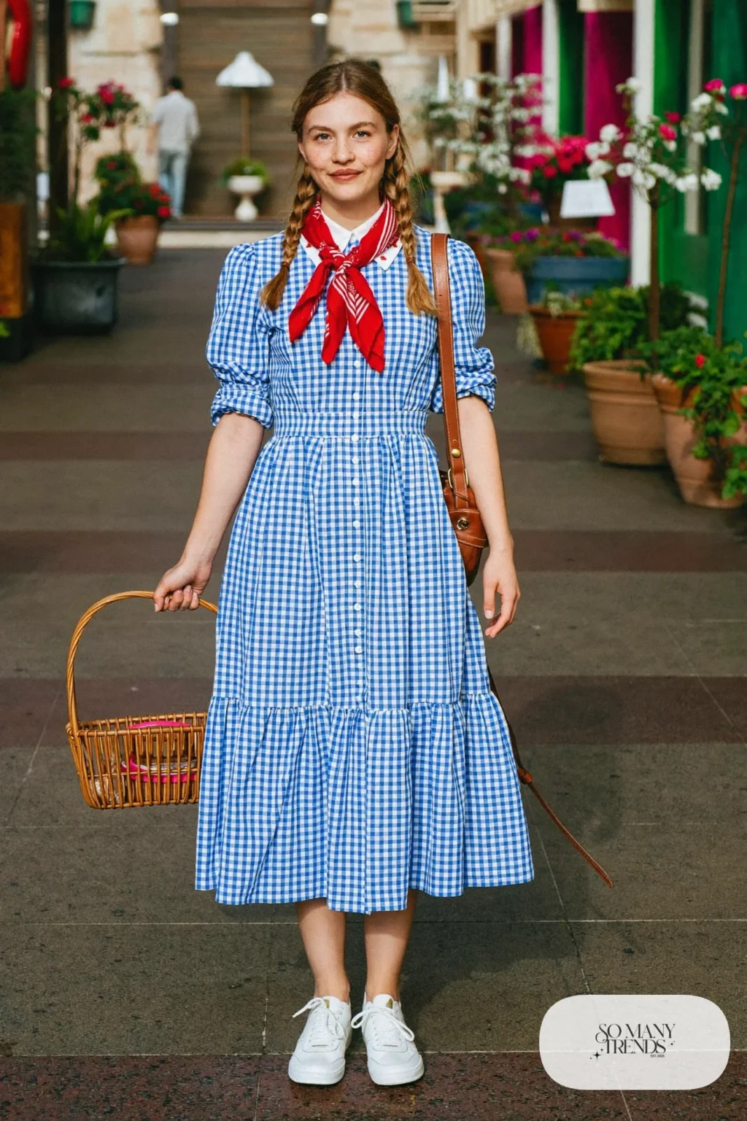 Blue gingham button-front dress, red neck bandana, caramel crossbody bag and white sneakers, outfit 5