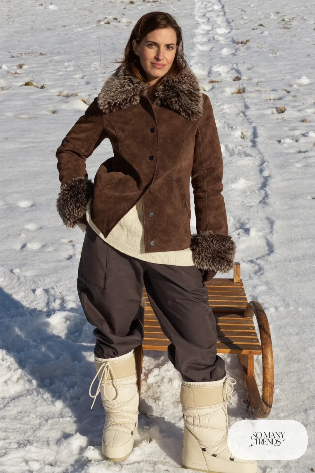 Chocolate brown suede-look jacket with fleece collar over knit sweater with leggings and snow boots, outfit 10