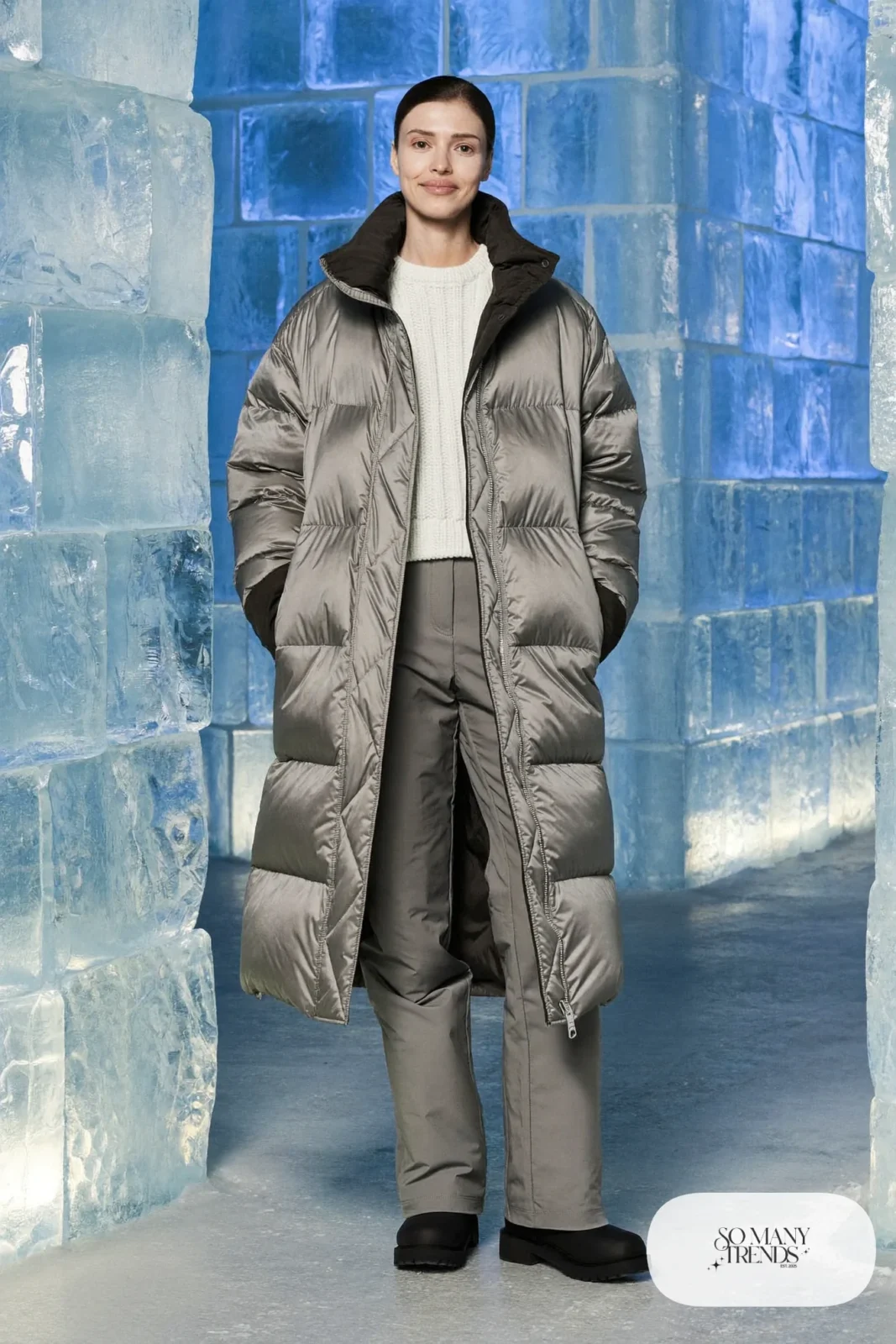 Long dove gray down coat with chunky sweater and insulated pants at ice hotel, outfit 21