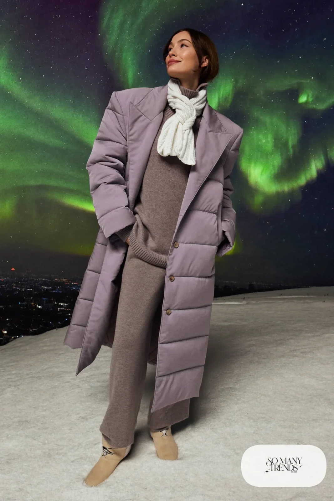Lilac long down coat with dove gray knit, wool pants, cream boots and scarf under northern lights, outfit 28