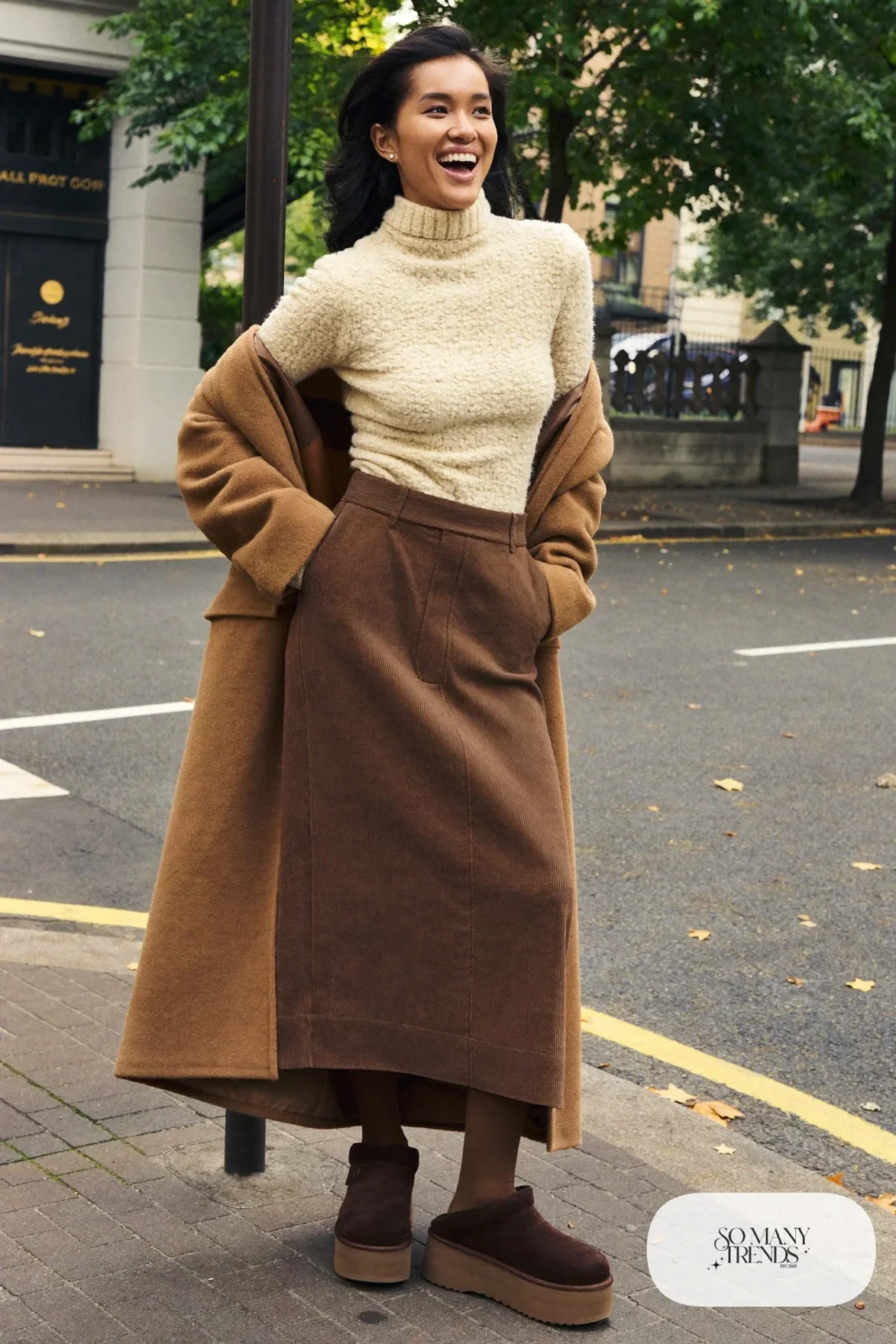Cream turtleneck, brown corduroy midi skirt, brown tights and chocolate Ugg clogs, outfit 12