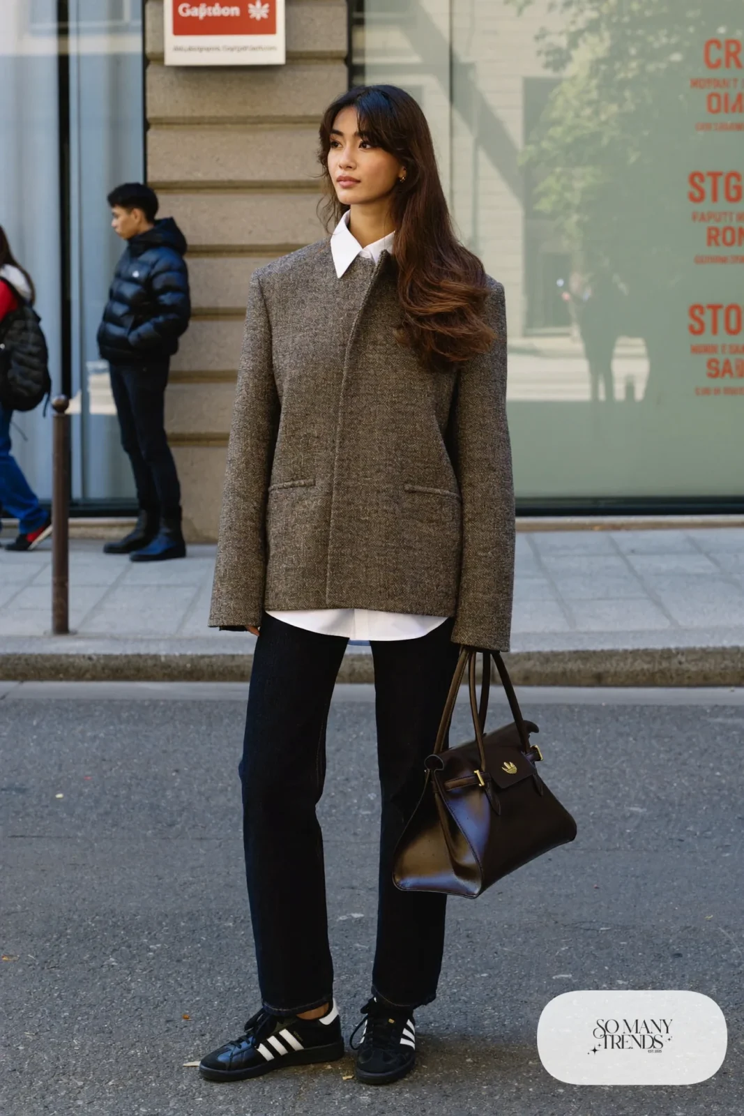 Woman in boxy gray tweed jacket, white shirt, dark straight jeans and black Adidas Campus sneakers, outfit 22