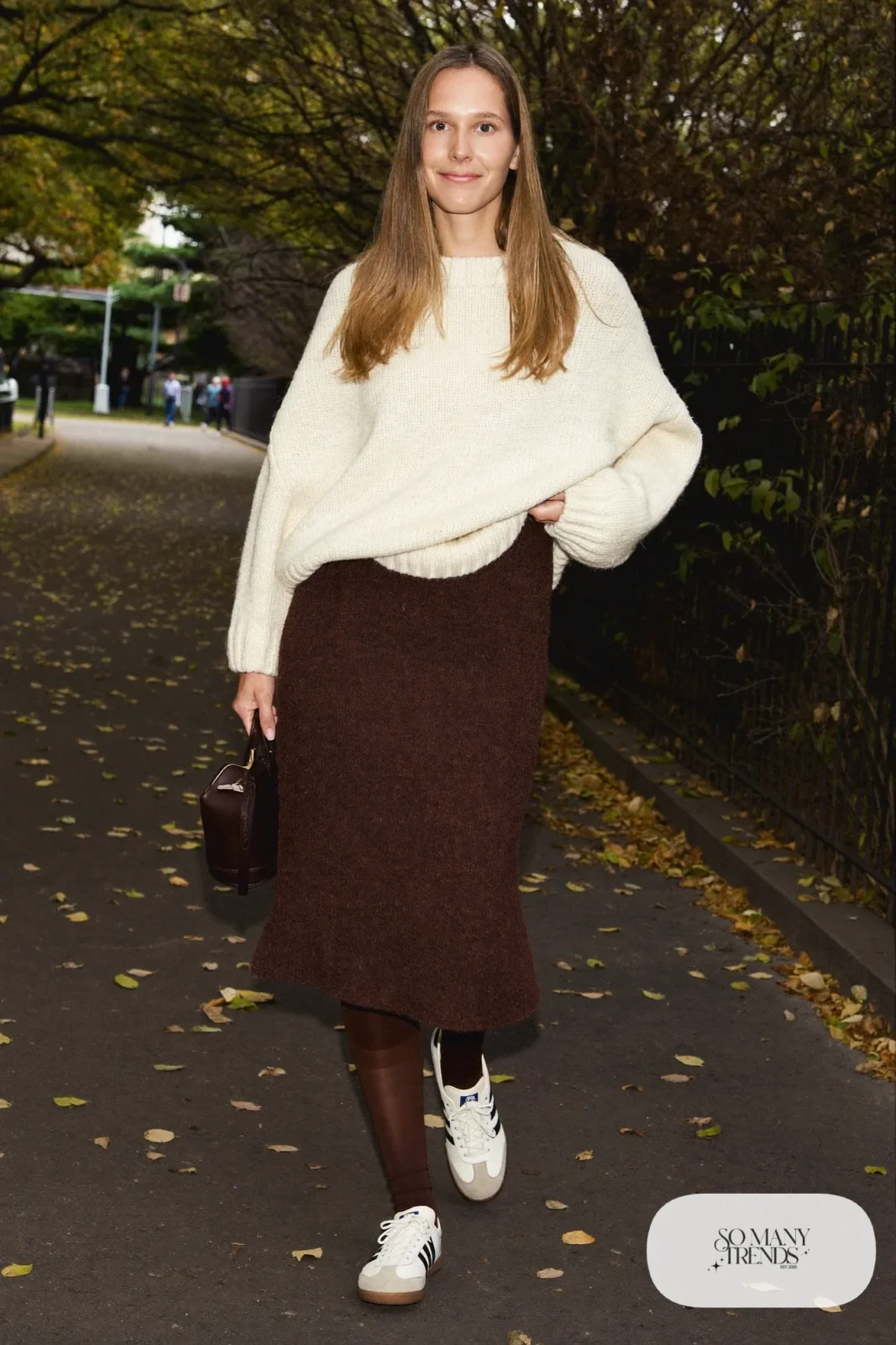 Chocolate brown knit midi skirt, cream sweater, brown tights and low retro sneakers, outfit 23