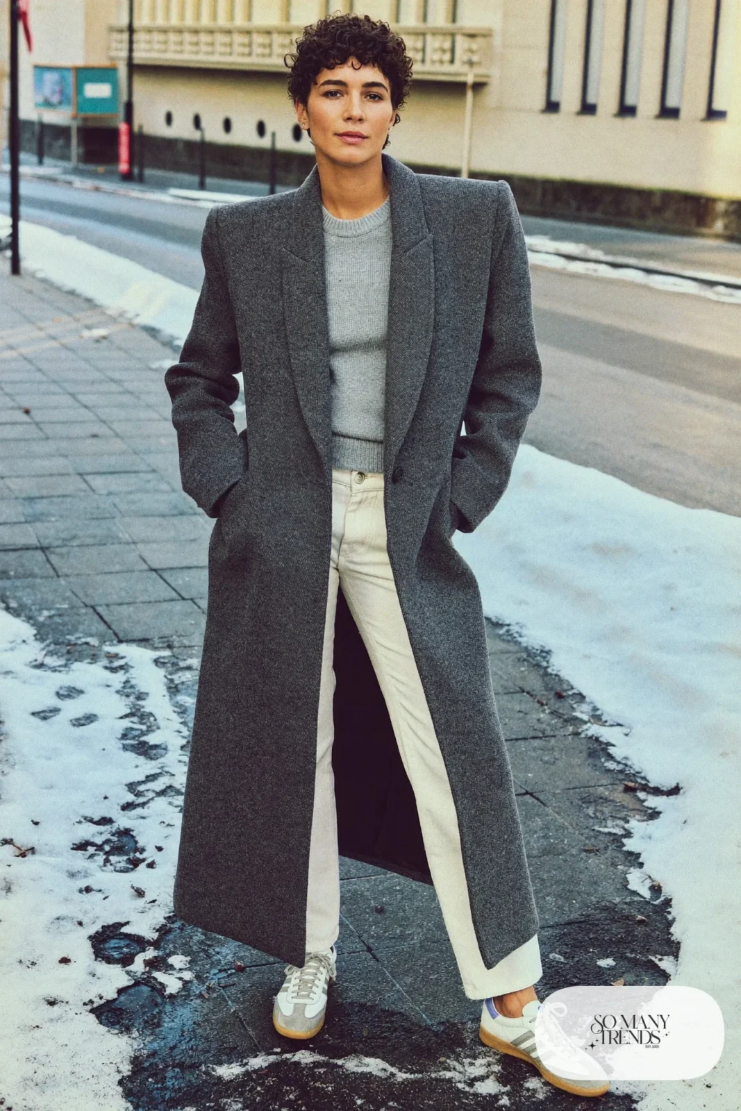 Charcoal wool overcoat, gray sweater, cream straight jeans and low retro sneakers, outfit 24