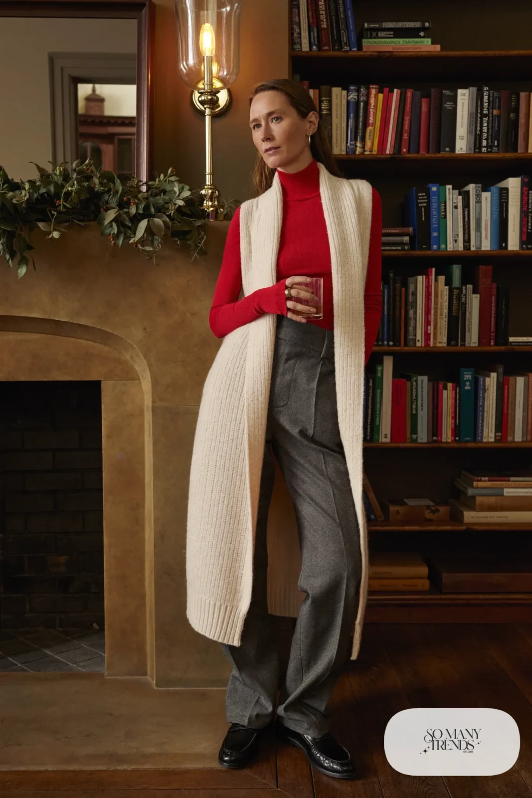 Red fine-knit turtleneck with long ivory knit vest, gray wool straight pants and black loafers, outfit 12