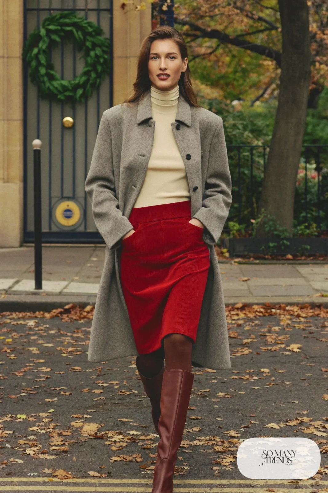 Gray wool coat over cream turtleneck and red corduroy midi skirt with brown tights and brown boots, outfit 24