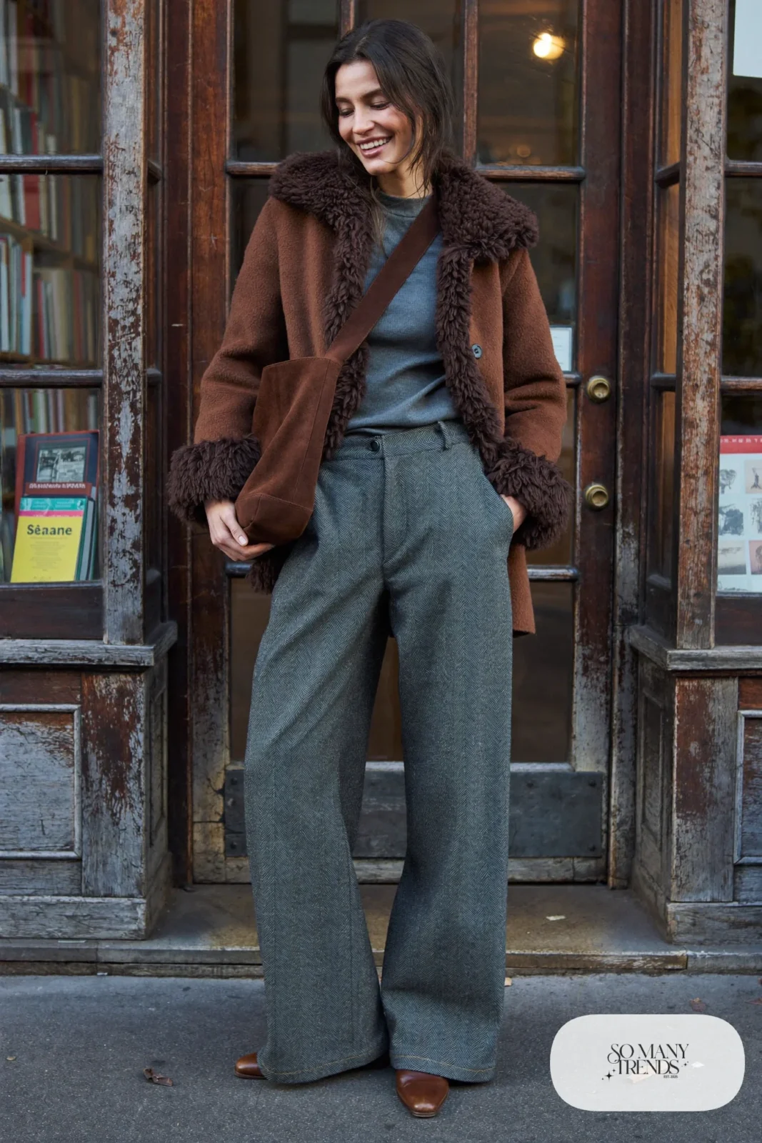 Brown shearling jacket, charcoal knit top, wide gray wool pants and brown boots, outfit 12