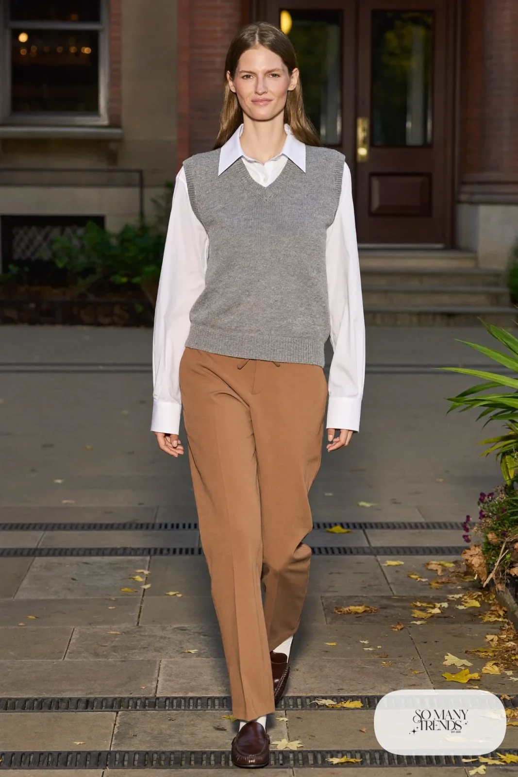 Gray knit vest, white button shirt, tan pants and brown loafers, outfit 17