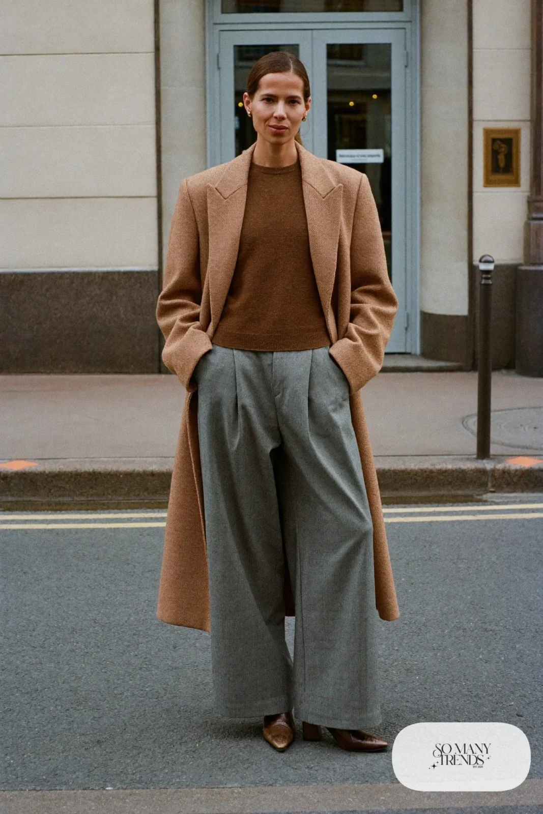 Gray flannel wide-leg pants, brown fine knit, tan overcoat and brown pointed boots, outfit 24