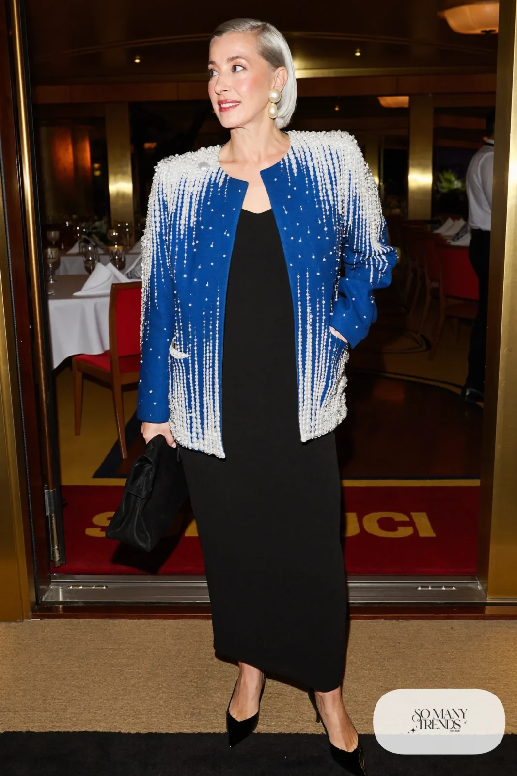 Cobalt blue beaded jacket over black column dress with black pumps, formal night cruise look 15