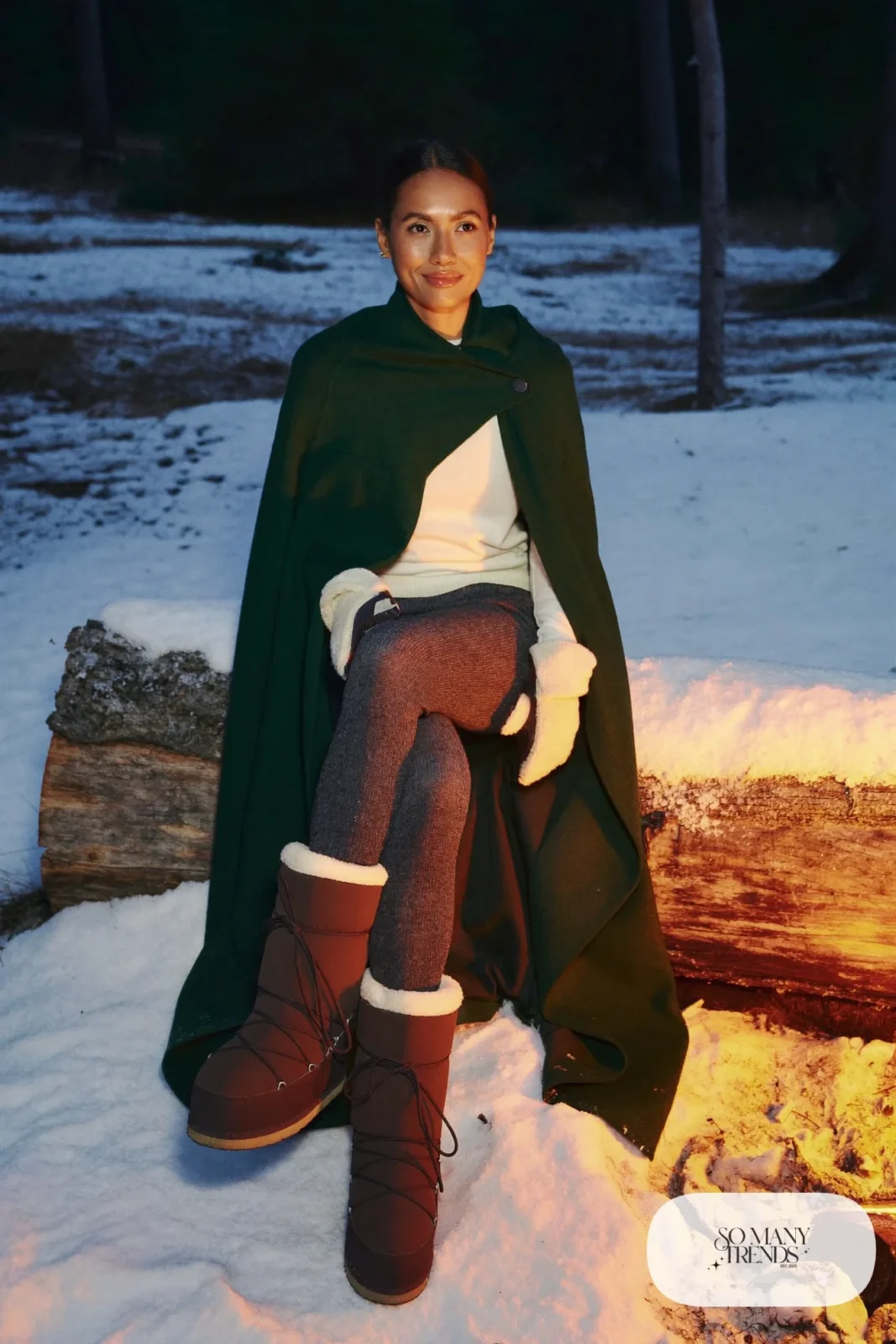 Forest green wool cape over base layer with fleece leggings, boots and sheepskin mittens, outfit 6