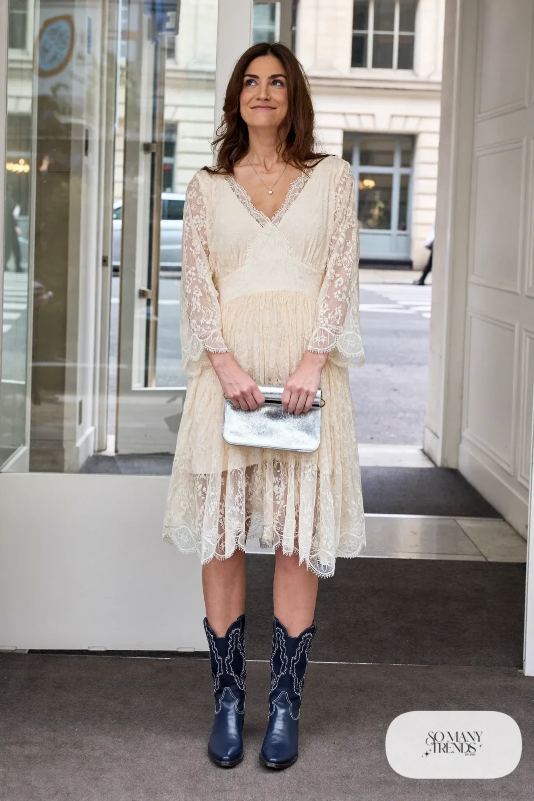 Woman in ivory lace western dress and navy cowboy boots, outfit 16