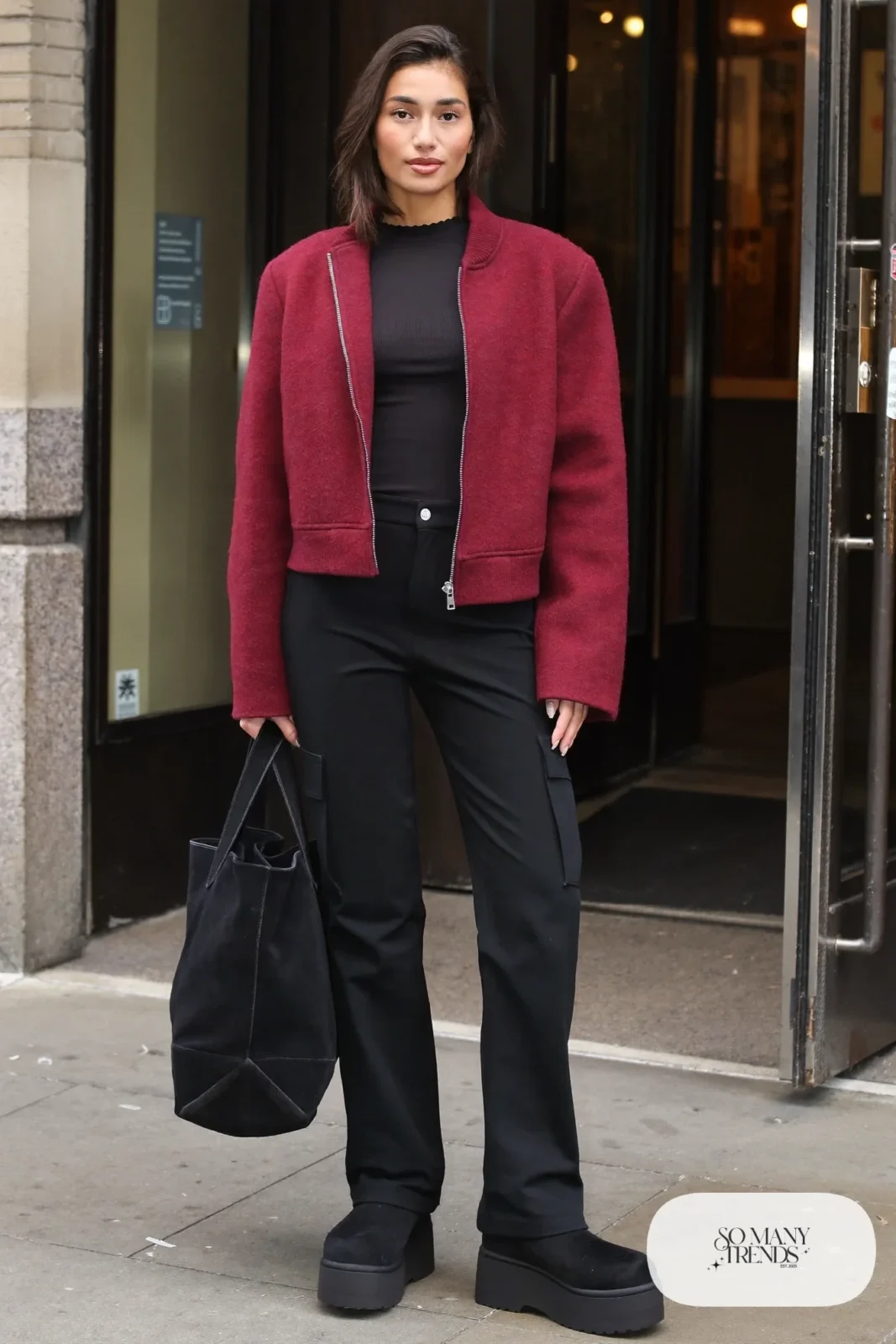 Wine wool bomber jacket, black ribbed tee, black straight cargo pants and black Ugg clogs, outfit 13