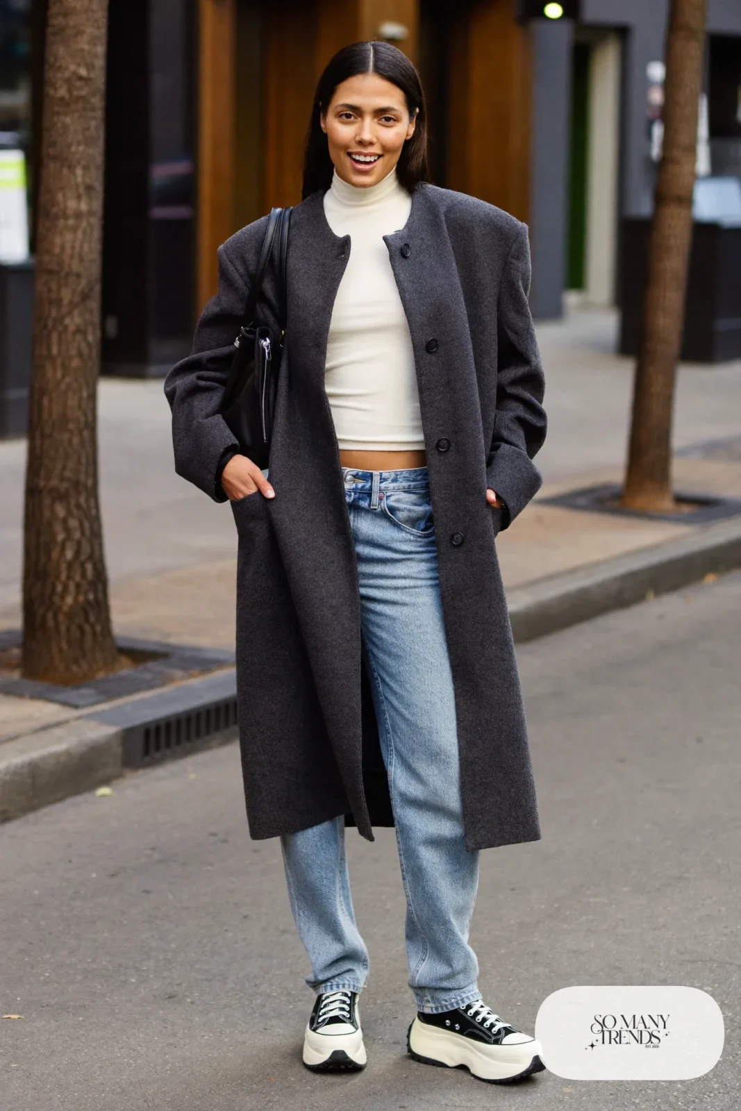 Woman in a long charcoal wool coat, ivory turtleneck, straight light-wash jeans and black Converse Run Star Hike platform sneakers - outfit 1