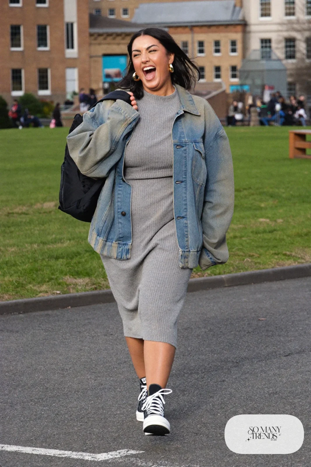 Woman in a gray knit midi dress, oversized denim jacket, black tights and black Converse Run Star Hike platform sneakers - outfit 5