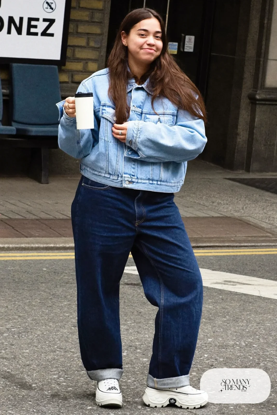 Woman in a pale blue denim jacket, dark wide-leg jeans, lavender wool scarf and white Converse Run Star Hike platform sneakers - outfit 10