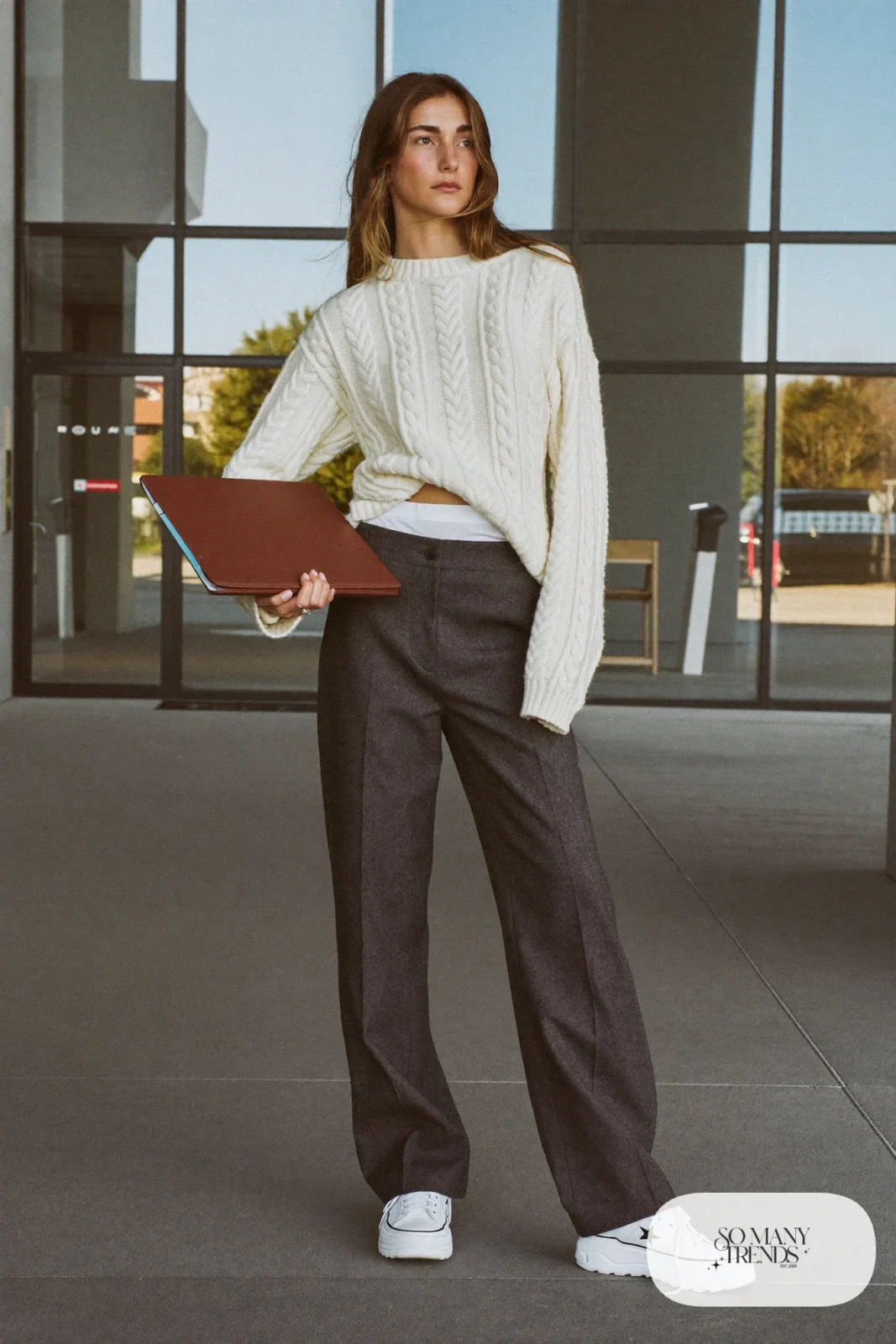 Woman in an ivory cable-knit sweater, charcoal wool-blend pants, black belt and white Converse Run Star Hike platform sneakers - outfit 12