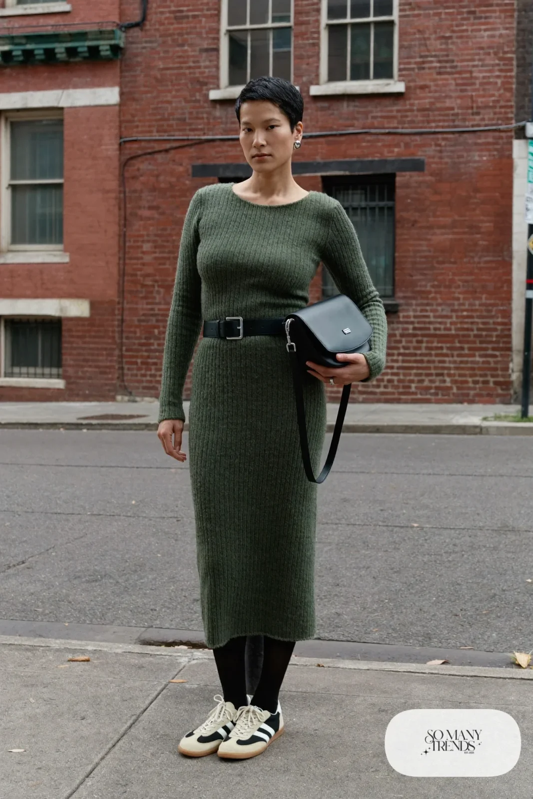 Forest green ribbed knit midi dress, black opaque tights, wide black belt and low retro sneakers, outfit 4