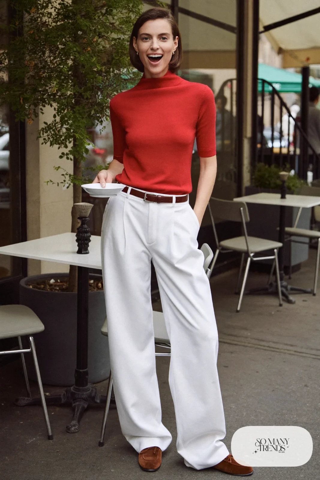 Red fine-knit mock-neck sweater with white wide-leg pants and brown loafers, outfit 9