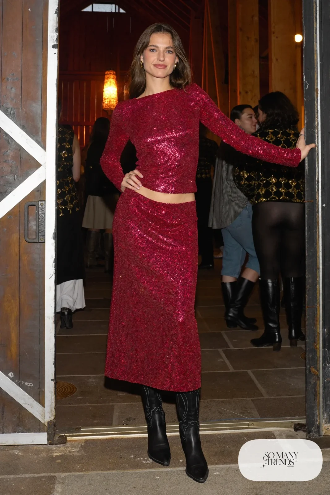 Wine sequin skirt and top set, tall black boots, long coat, look 20