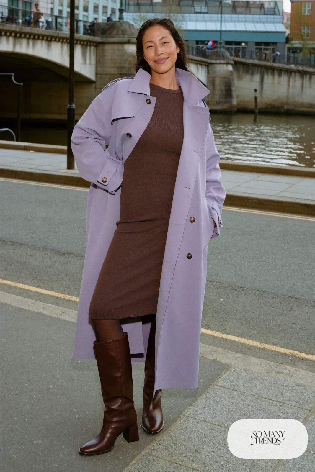 Woman in a lavender cotton trench coat, chocolate brown knit midi dress, sheer tights and brown leather ankle boots, outfit 20