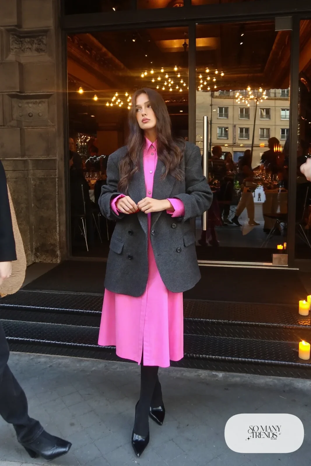 Woman in a pink long-sleeve shirt dress, oversize charcoal blazer, sheer tights and black pumps, outfit 18