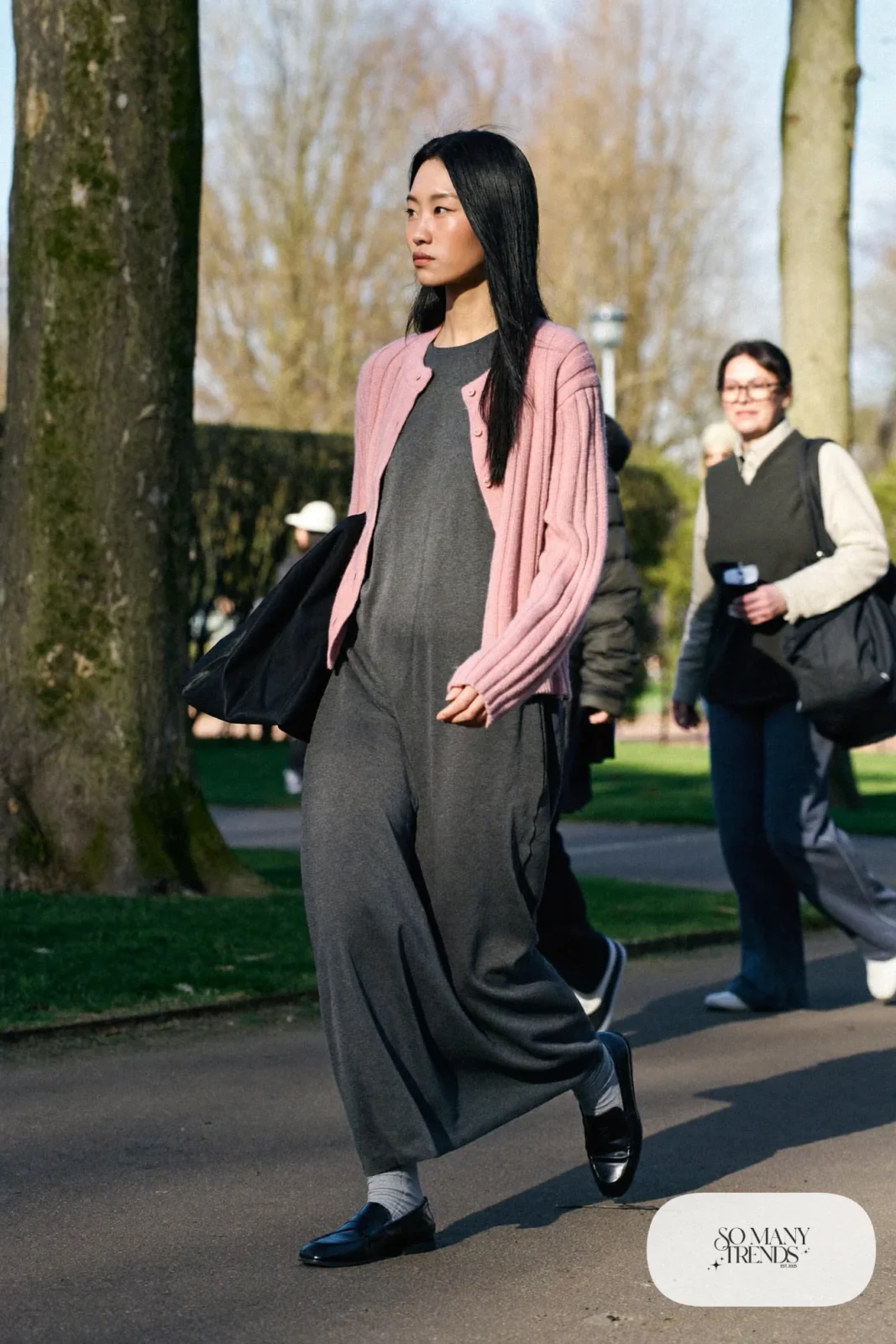 Woman in a blush ribbed cardigan, charcoal maxi dress, gray socks and black loafers, outfit 24